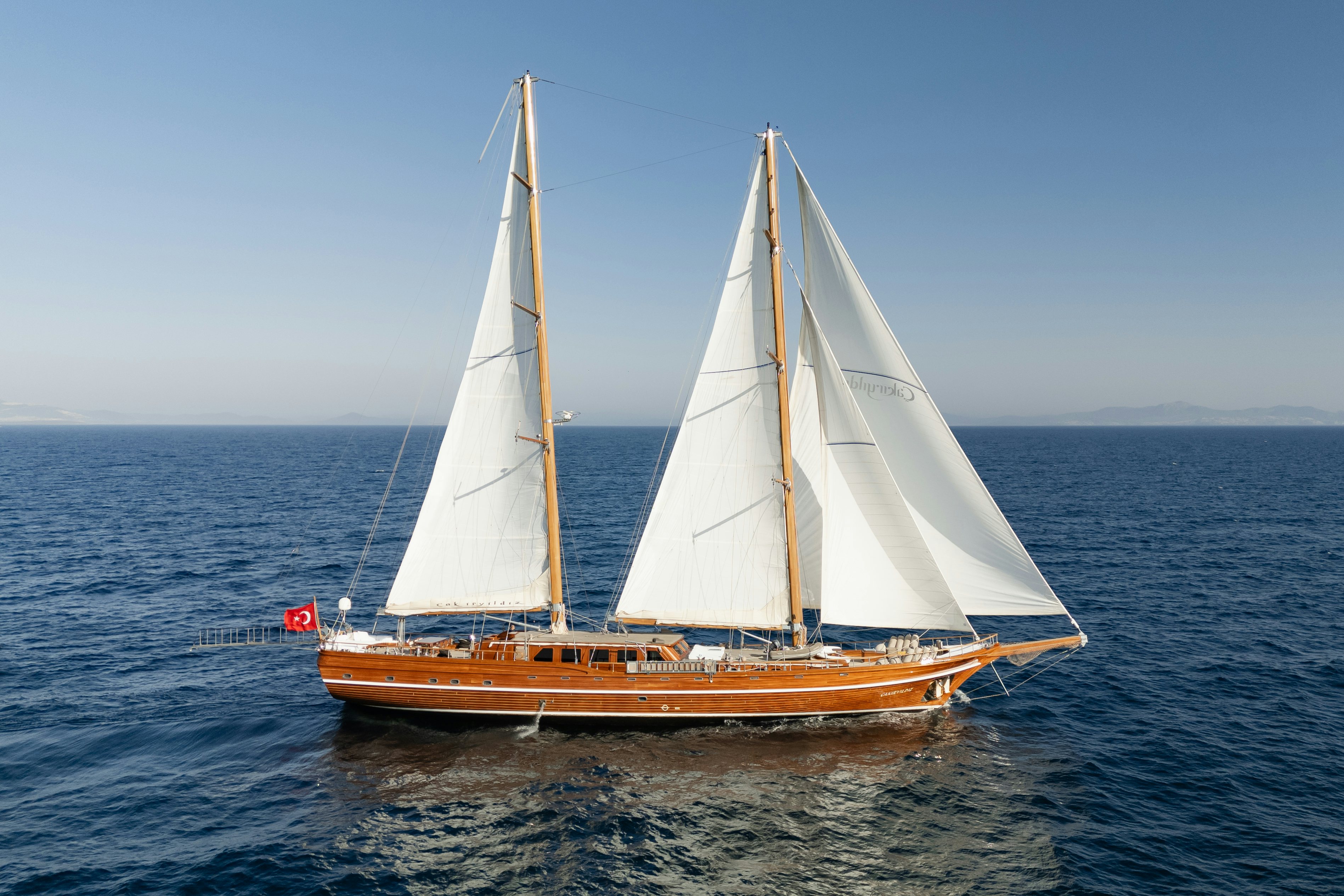 a sailboat on the water aboard CAKIRYILDIZ Yacht for Sale