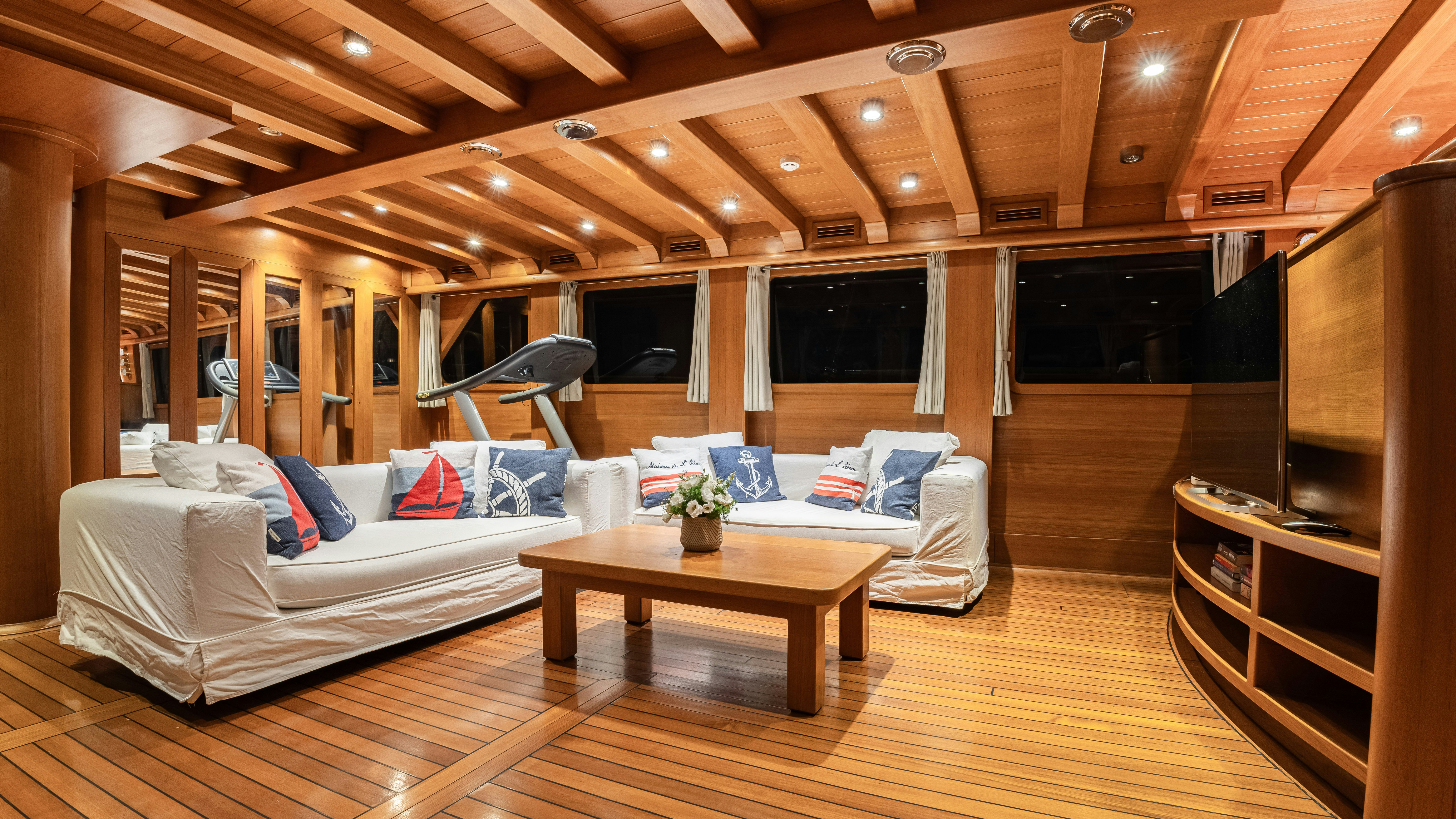 a room with a bed and a table aboard CAKIRYILDIZ Yacht for Sale