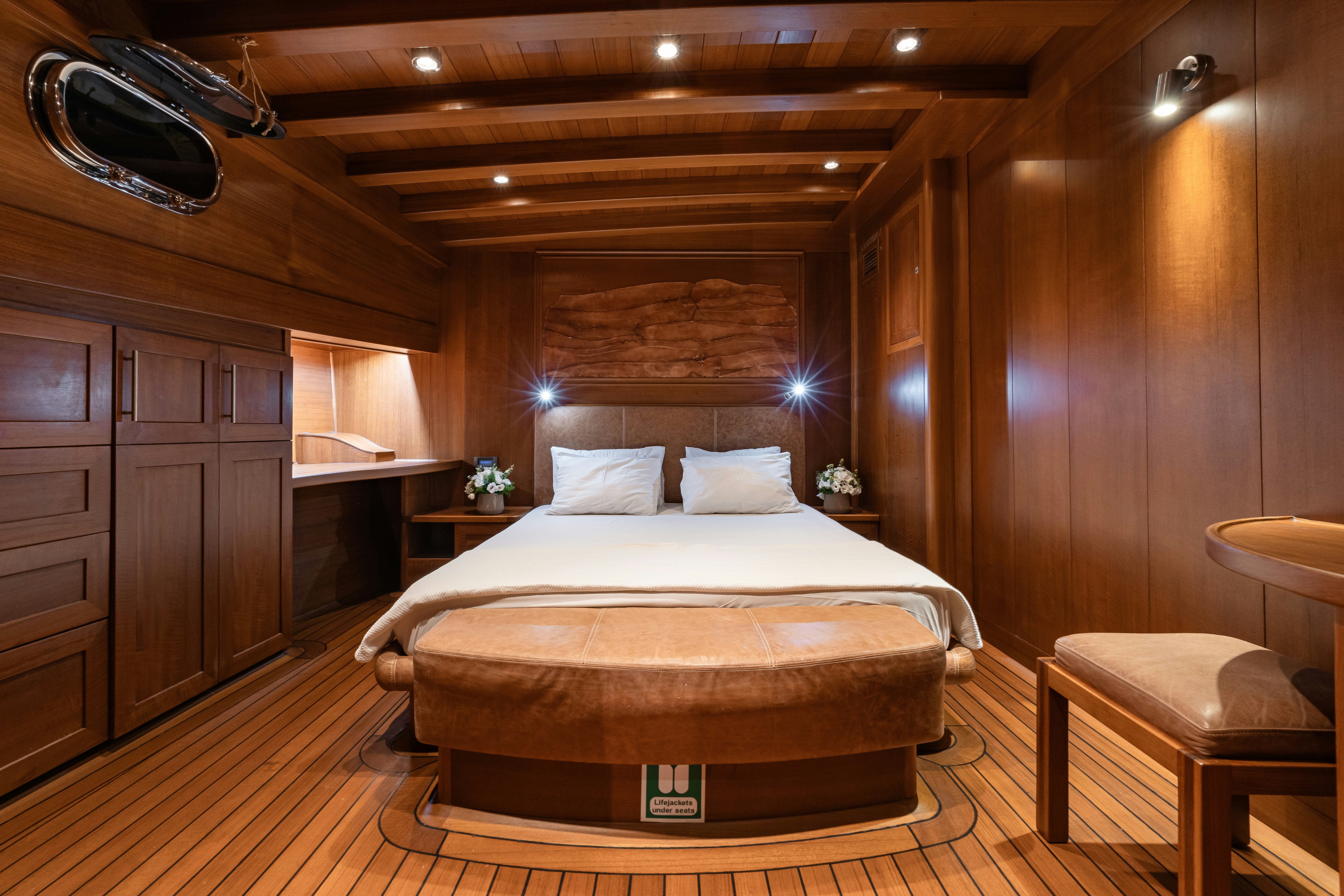 a bed in a room aboard CAKIRYILDIZ Yacht for Sale