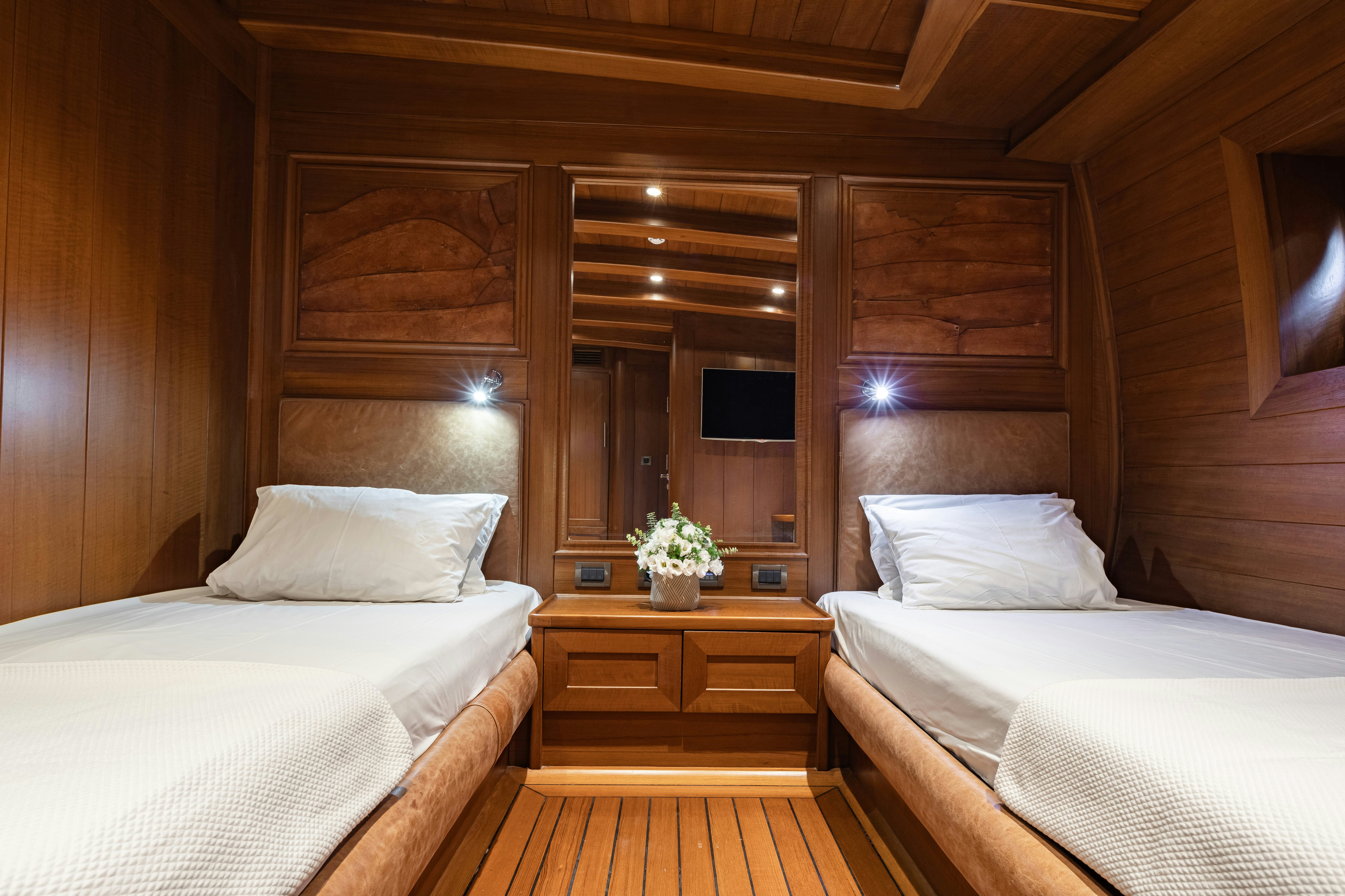 a room with two beds aboard CAKIRYILDIZ Yacht for Sale