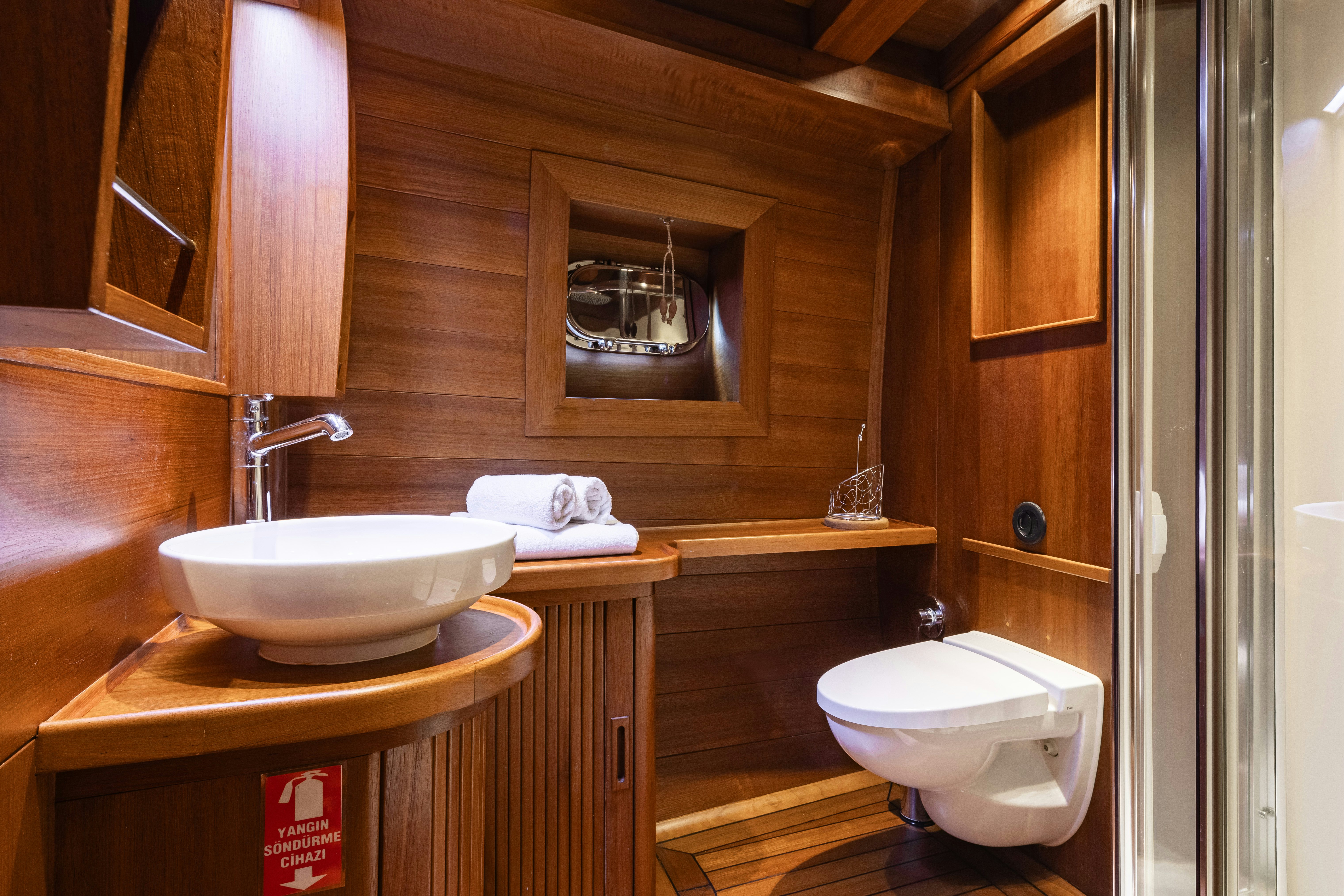 a bathroom with a sink and a toilet aboard CAKIRYILDIZ Yacht for Sale