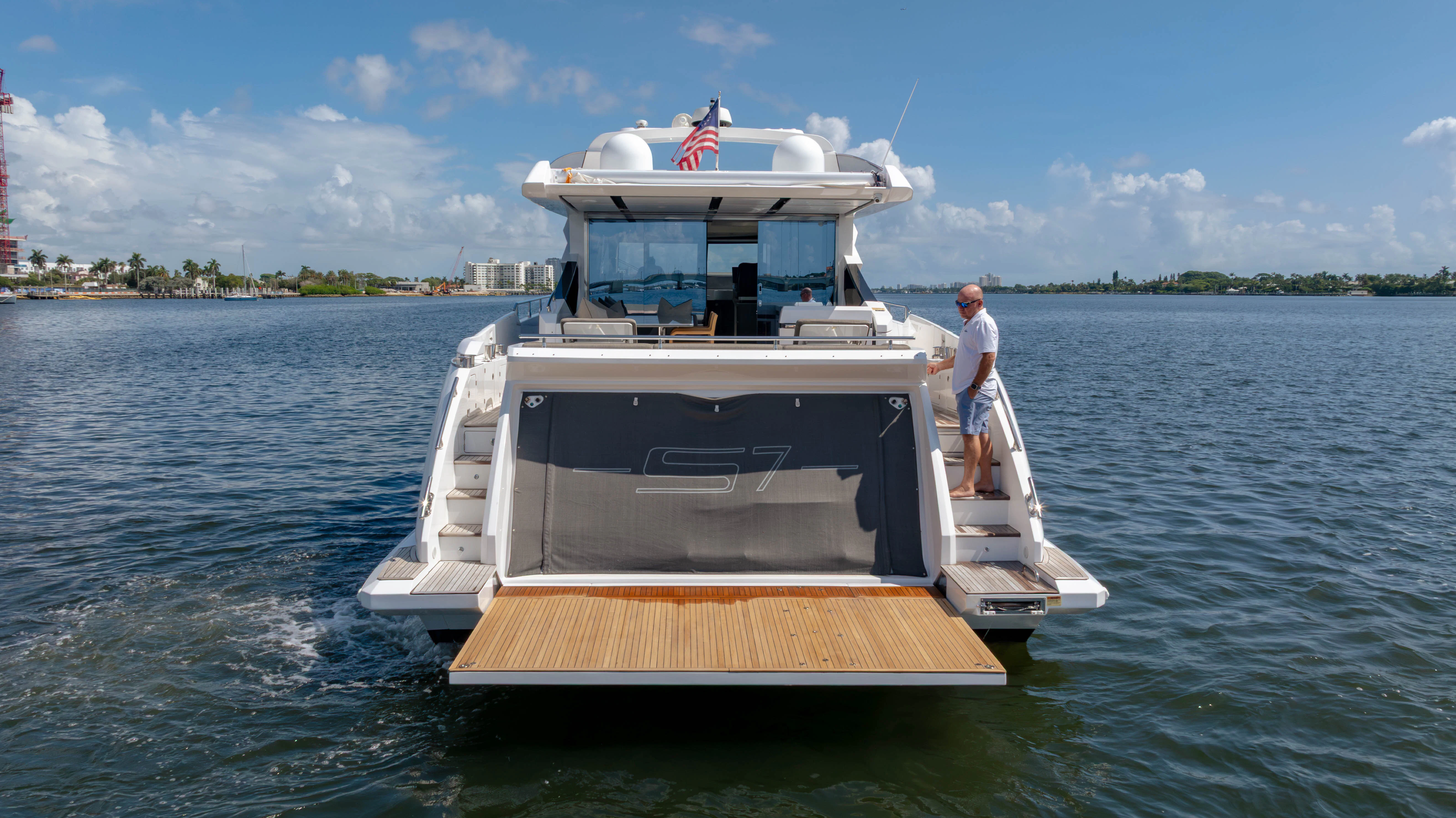 a person standing on a boat aboard ESCAPIST Yacht for Sale