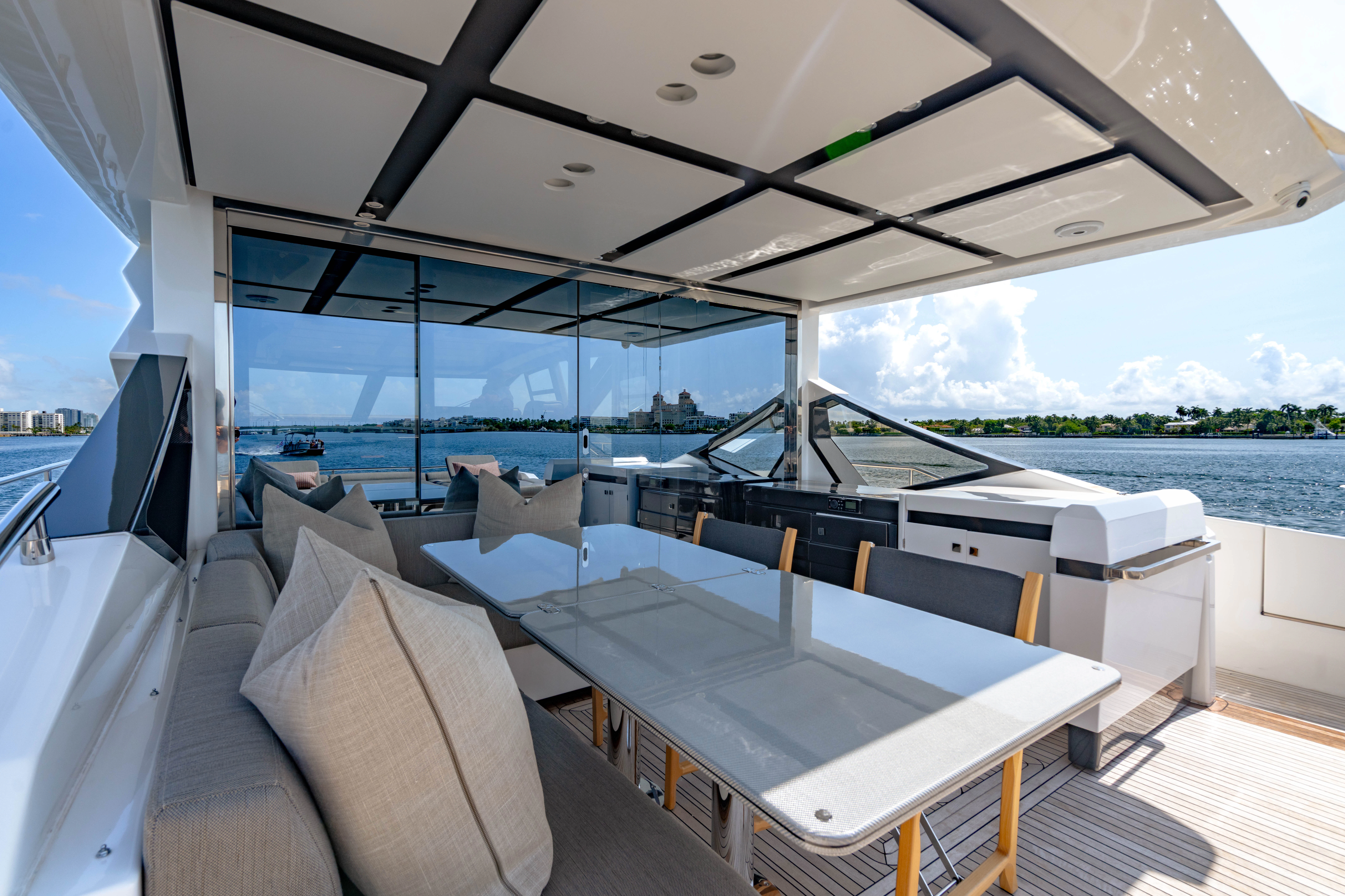 a room with a large window and a view of the water aboard ESCAPIST Yacht for Sale