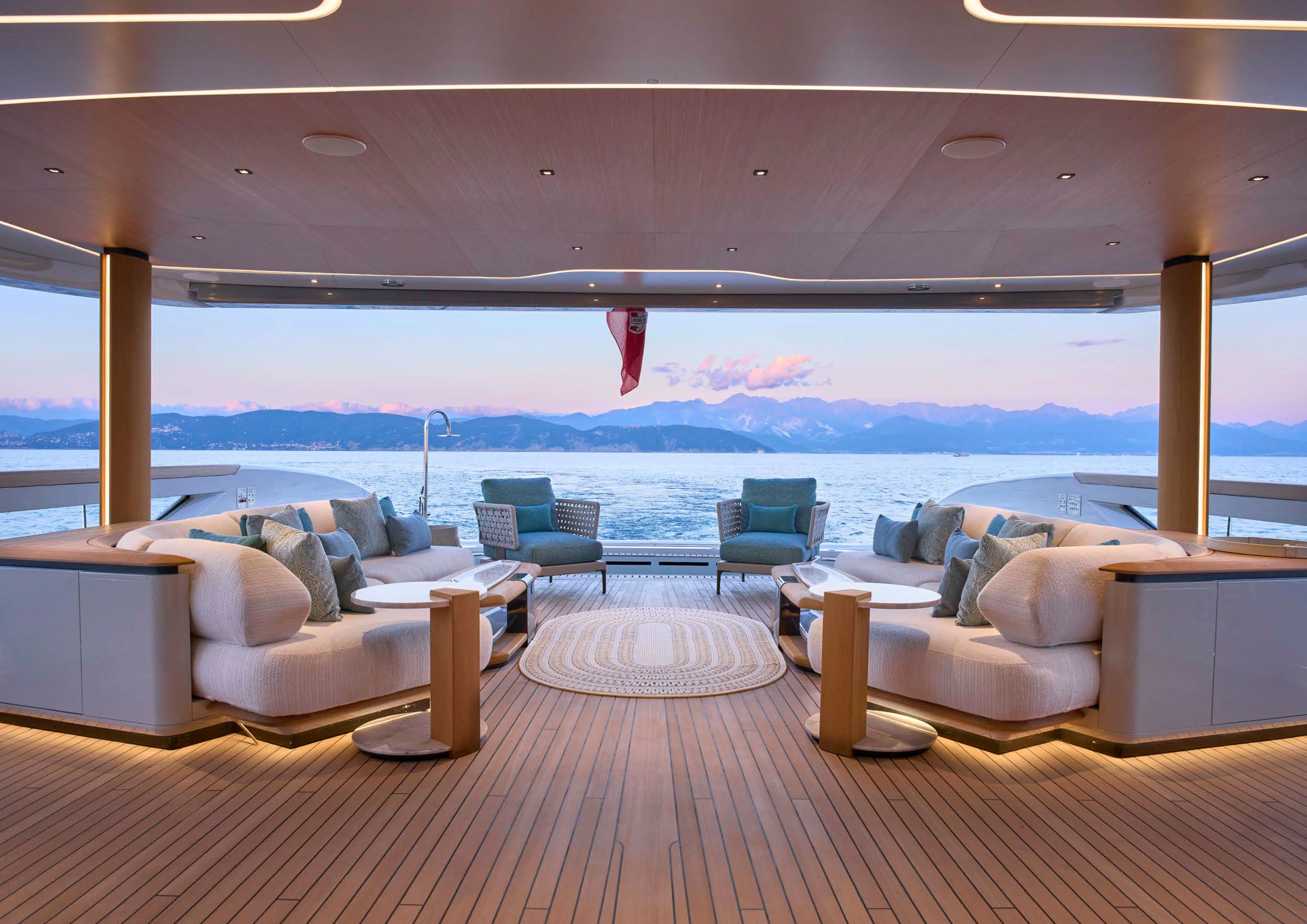 a room with a large window and a view of the ocean aboard AWANDRA Yacht for Charter