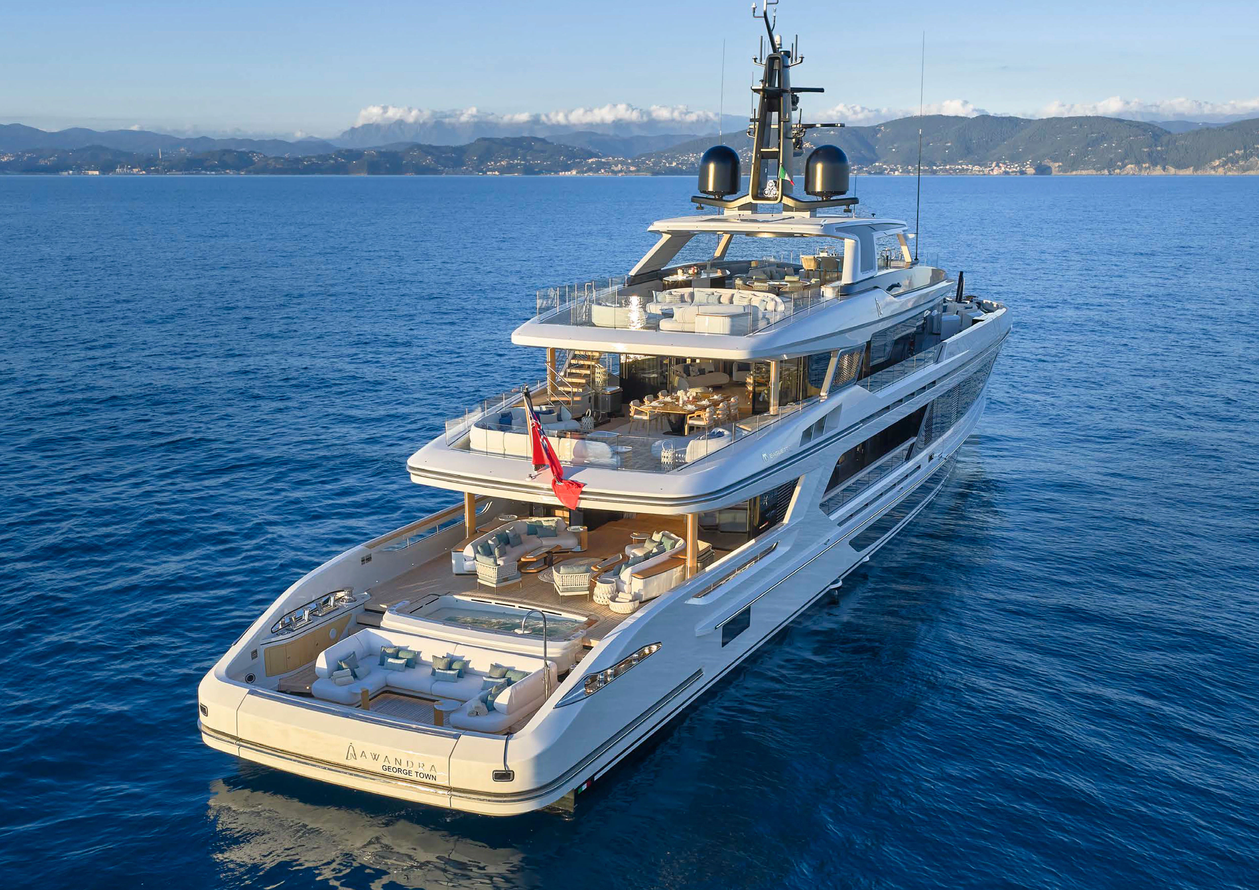 a large white boat in the water aboard AWANDRA Yacht for Charter
