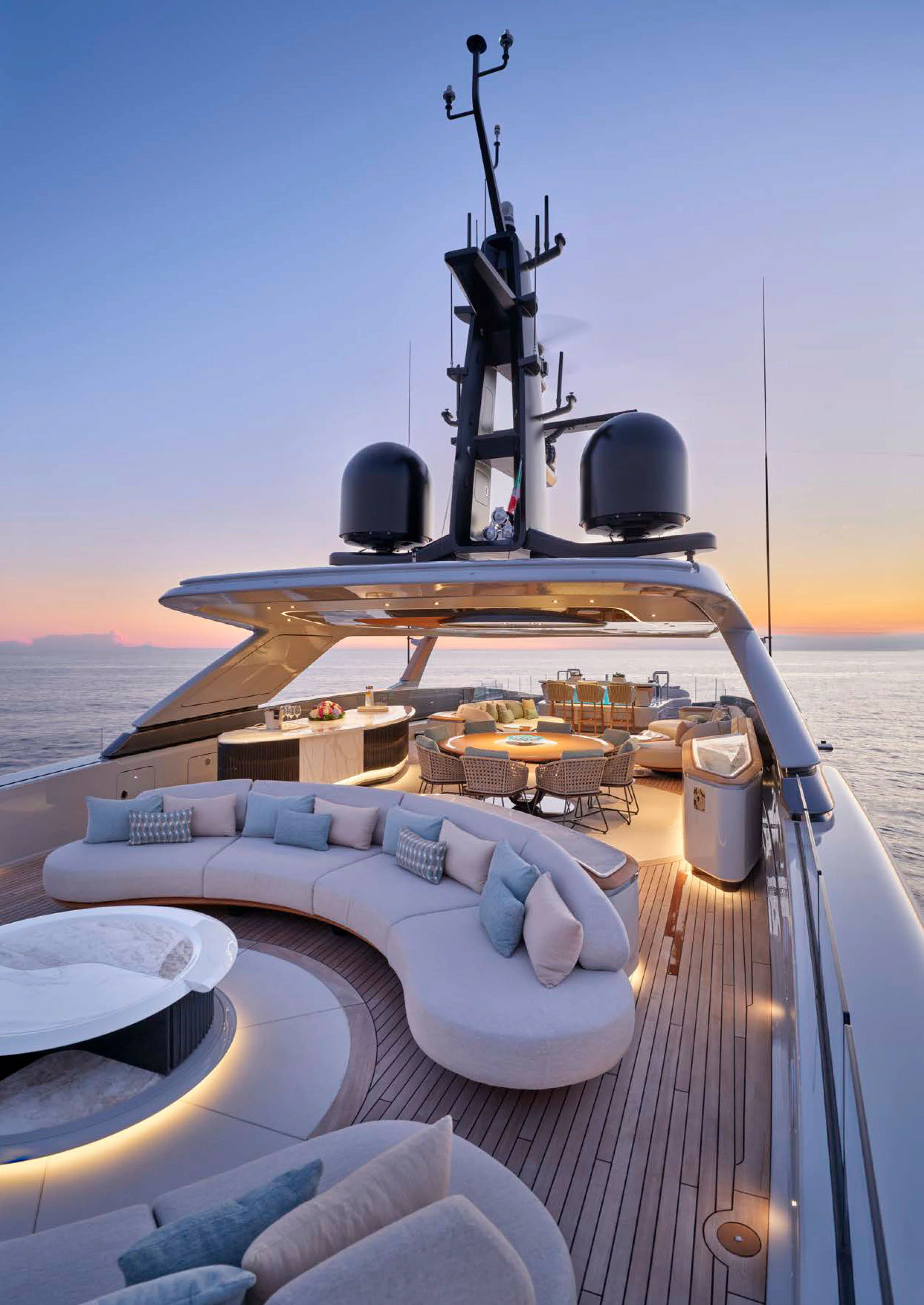 a boat with a large satellite dish on the deck aboard AWANDRA Yacht for Charter