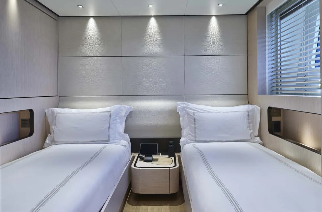 a couple of beds in a room aboard AWANDRA Yacht for Charter
