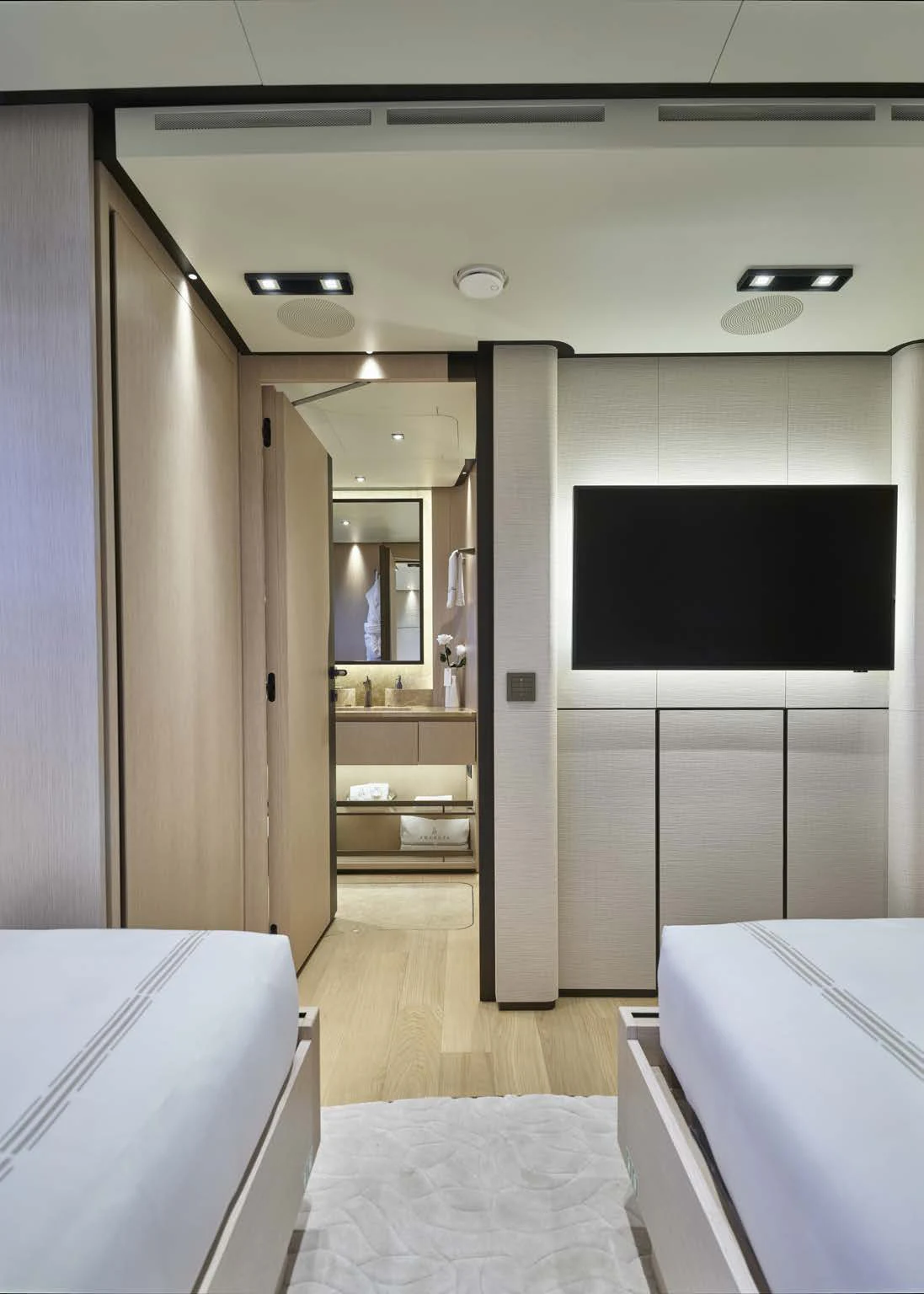 a bathroom with a large mirror aboard AWANDRA Yacht for Charter