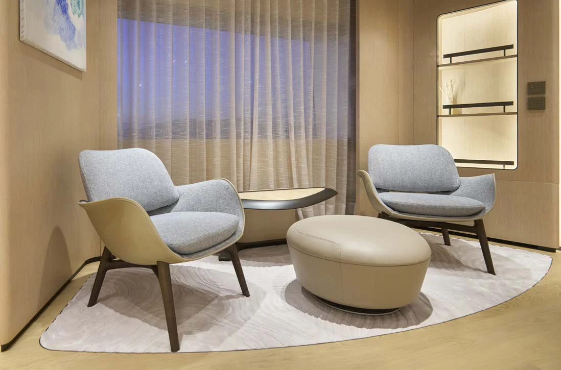 a room with a couple of chairs and a table aboard AWANDRA Yacht for Charter