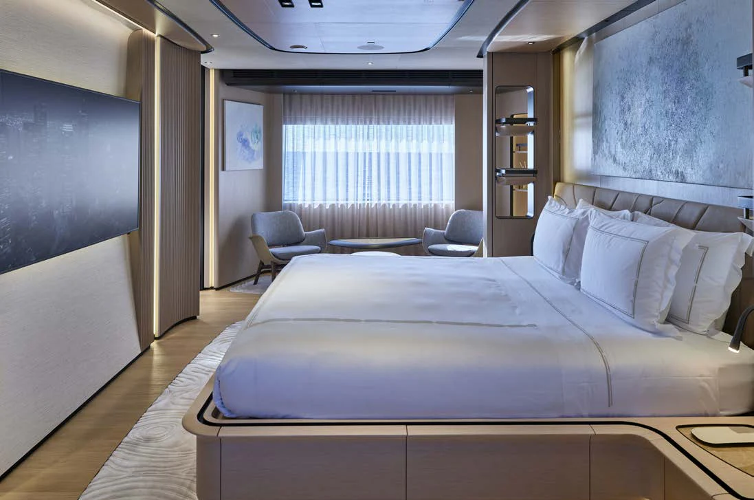 a large bed in a room aboard AWANDRA Yacht for Charter