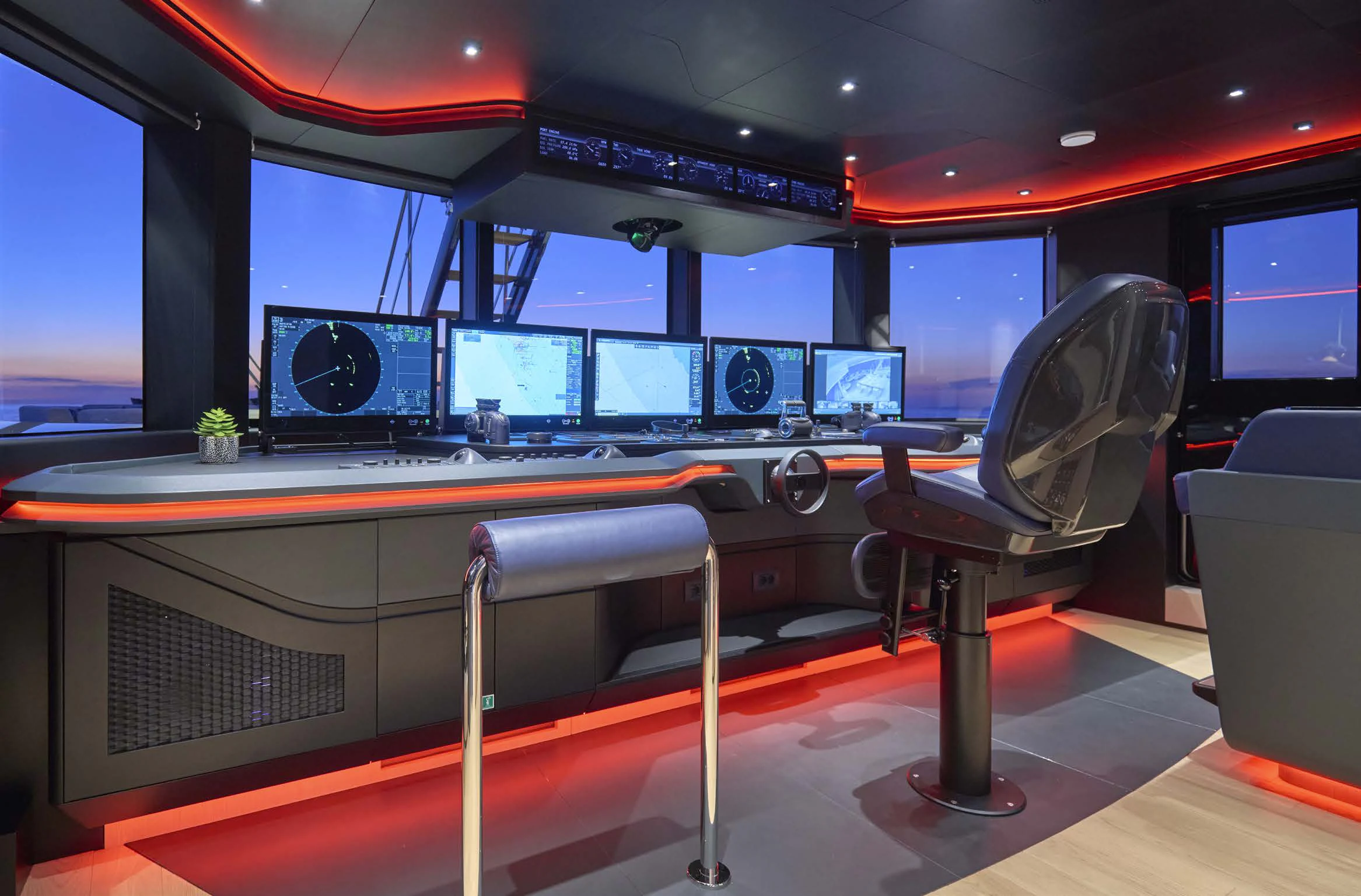 a room with a table and chairs aboard AWANDRA Yacht for Charter