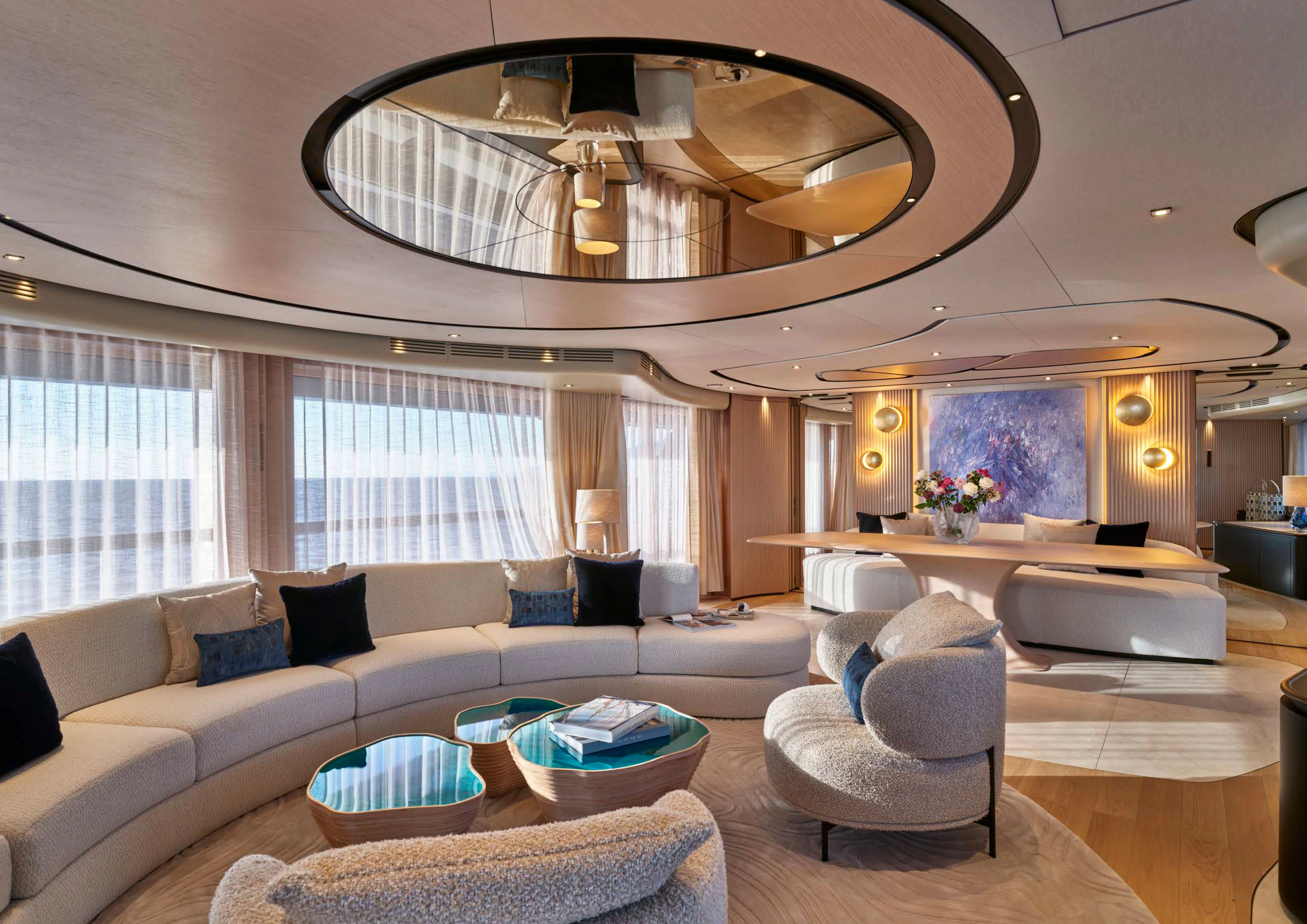 a living room with a chandelier aboard AWANDRA Yacht for Charter