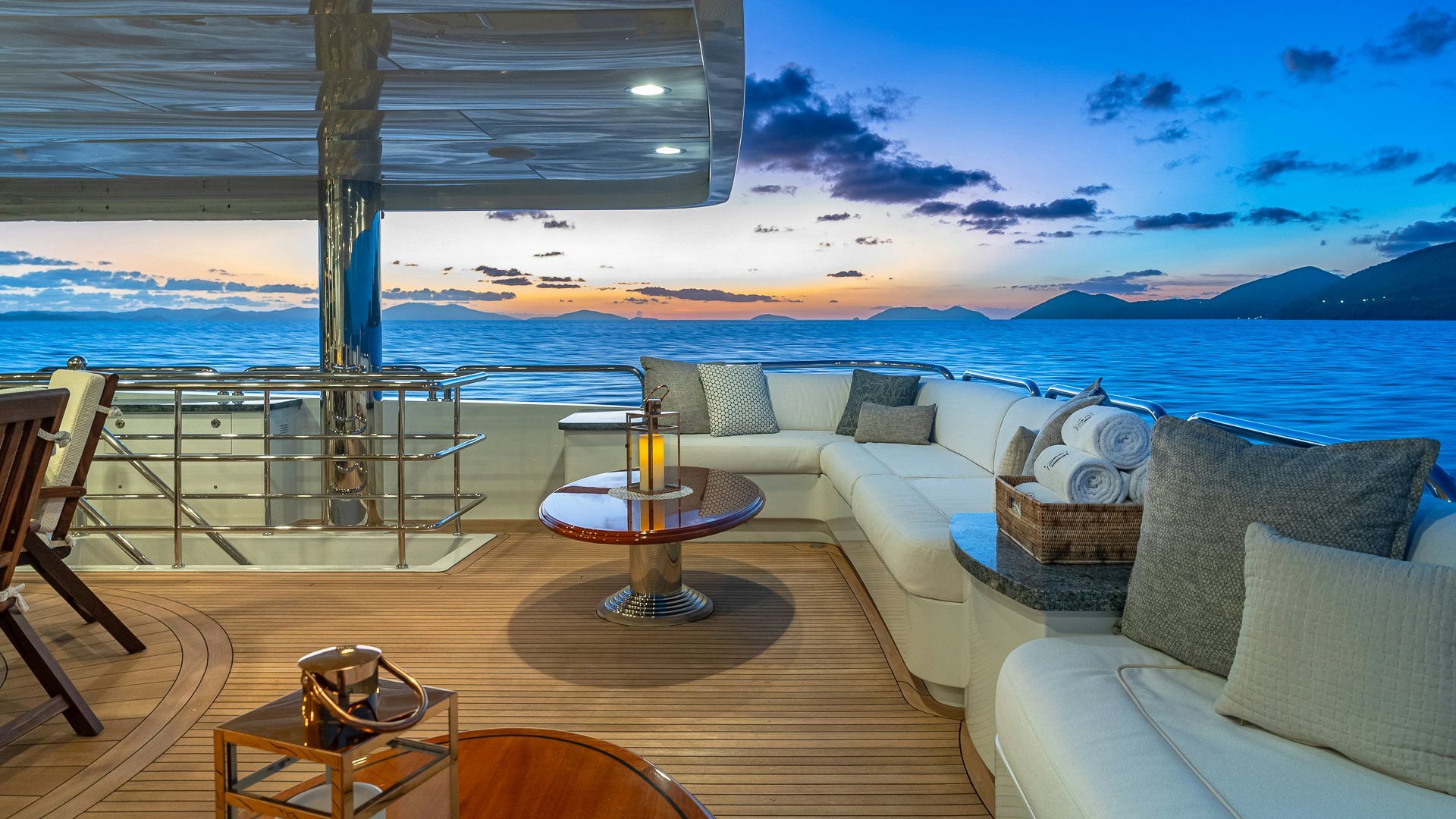 a room with a table and chairs aboard MILESTONE Yacht for Charter