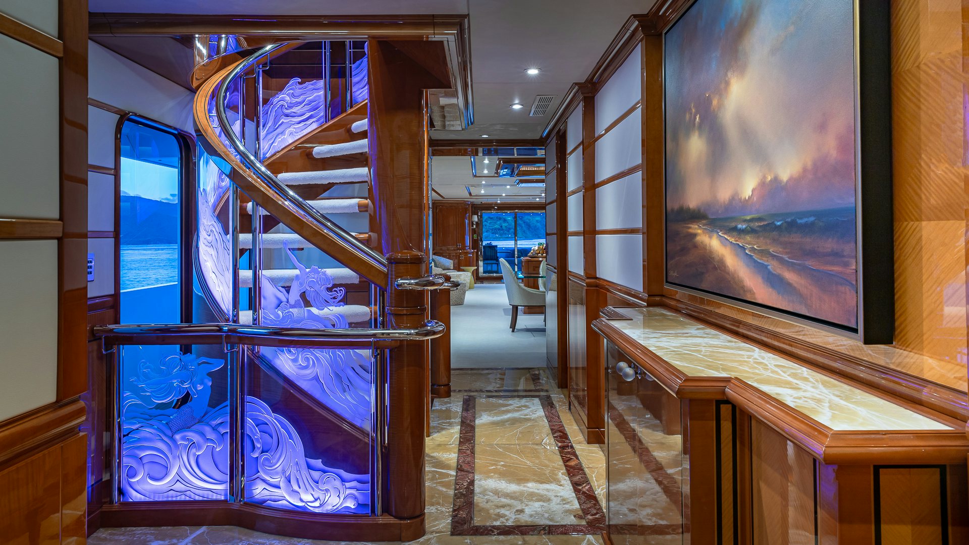 a room with a large staircase aboard MILESTONE Yacht for Charter
