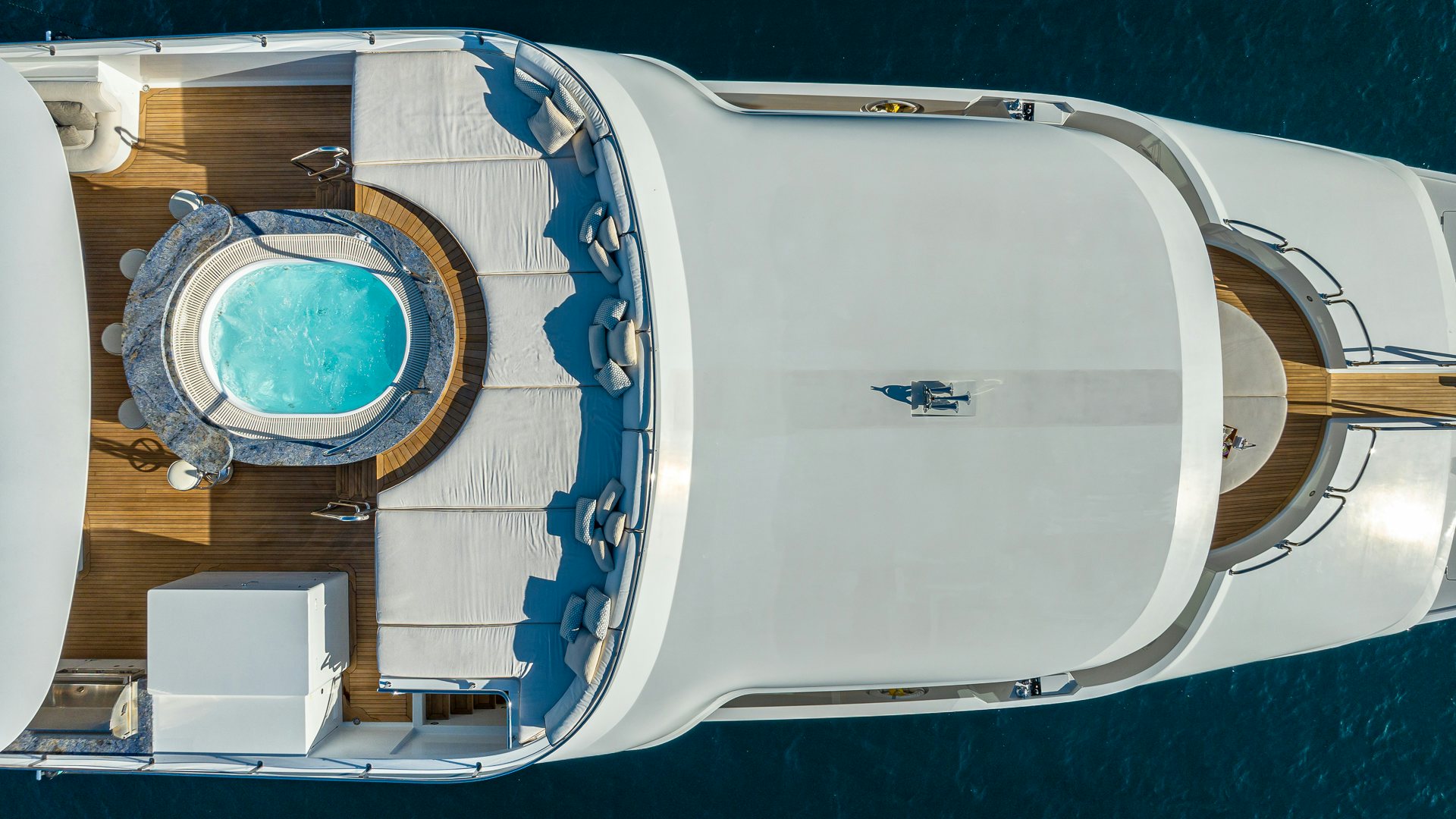 a large white machine aboard MILESTONE Yacht for Charter