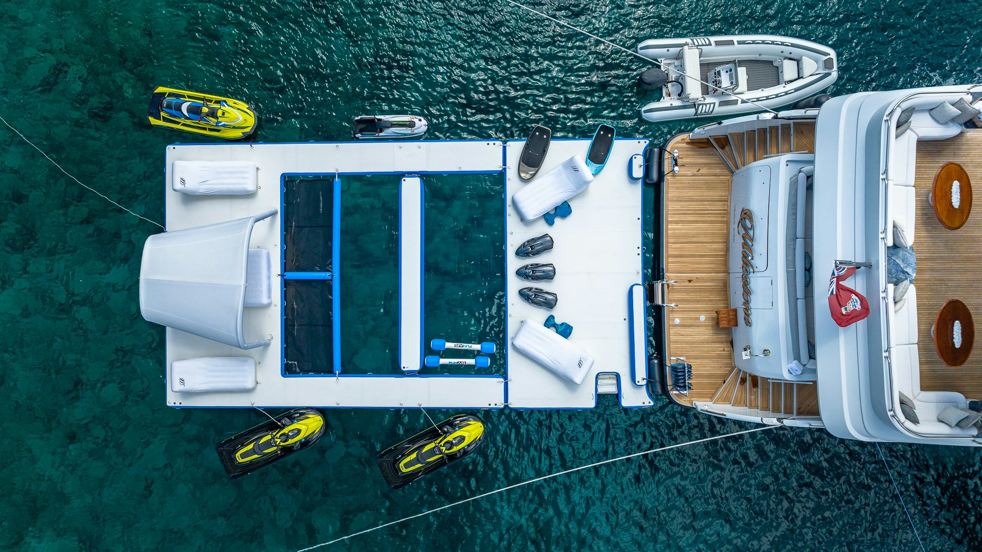 a group of white and yellow machines aboard MILESTONE Yacht for Charter