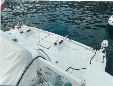 a white boat in the water aboard GOOD ENERGY TOO Yacht for Sale