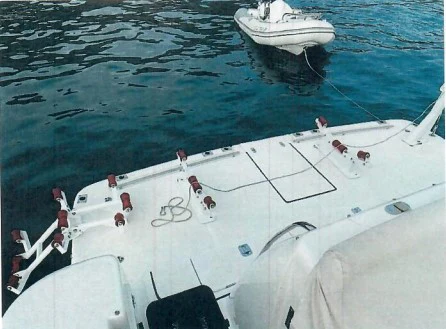 a boat with a rope attached to it aboard GOOD ENERGY TOO Yacht for Sale