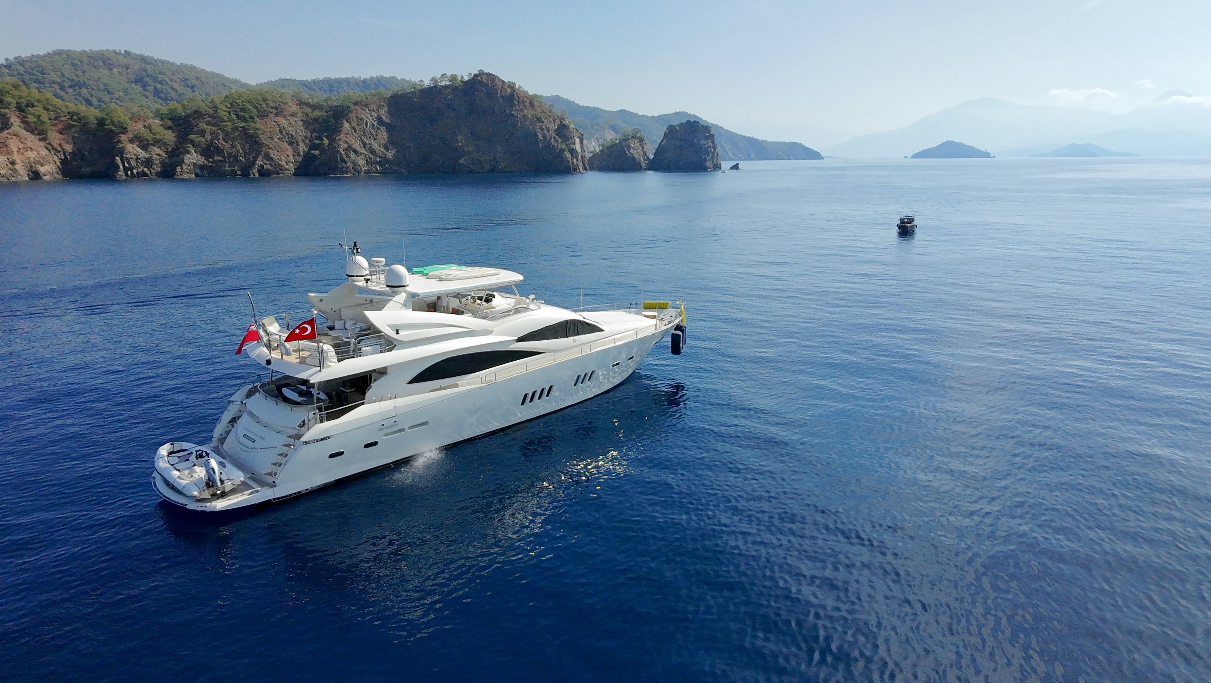 a boat on the water aboard SWORDFISH 68 Yacht for Sale