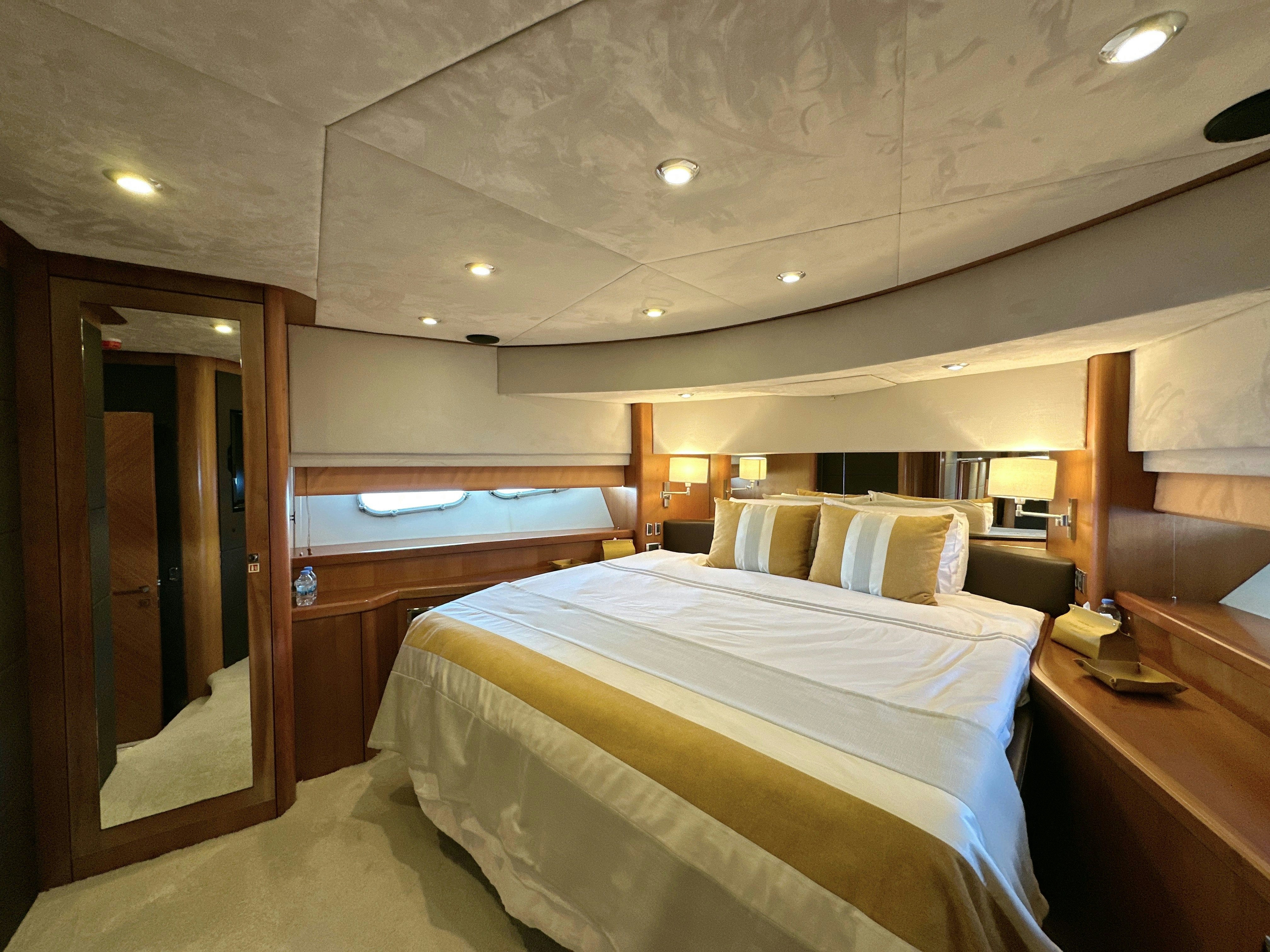 a room with two beds aboard SWORDFISH 68 Yacht for Sale