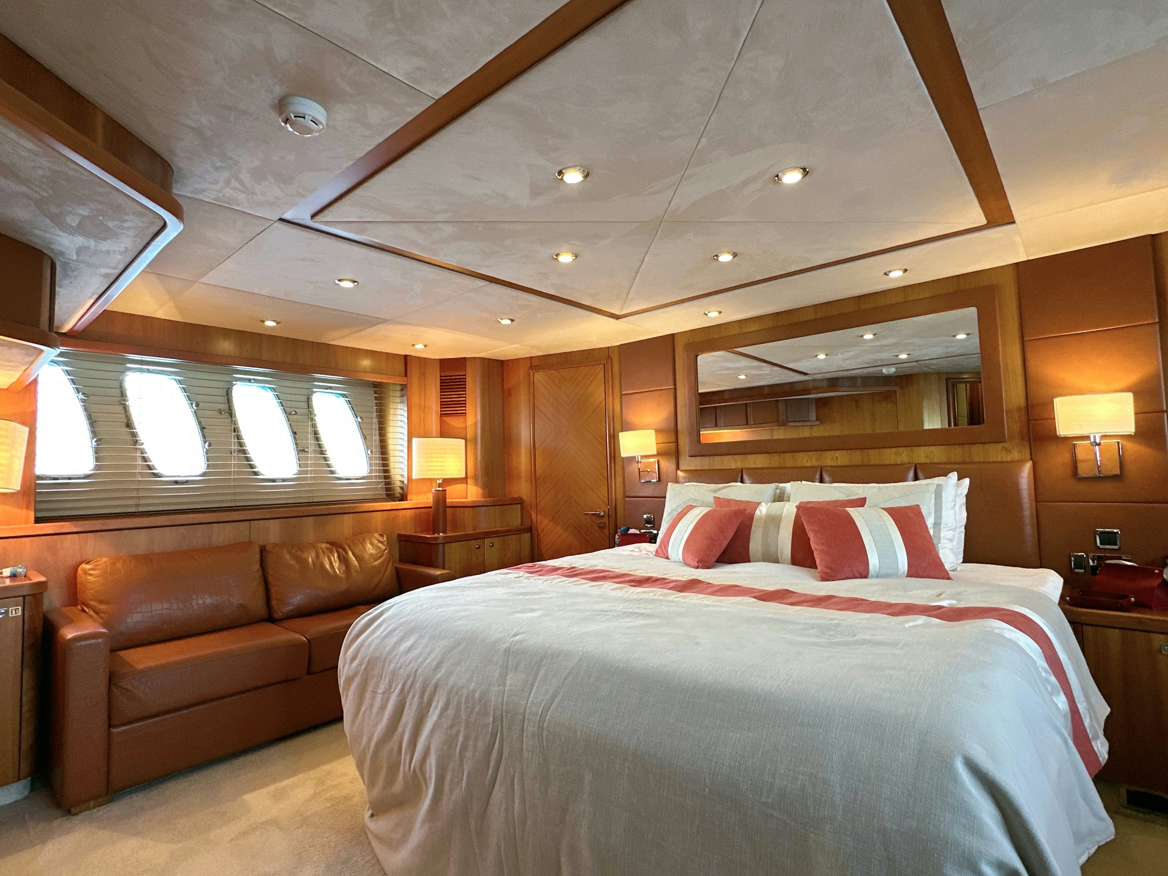 a bed in a hotel room aboard SWORDFISH 68 Yacht for Sale