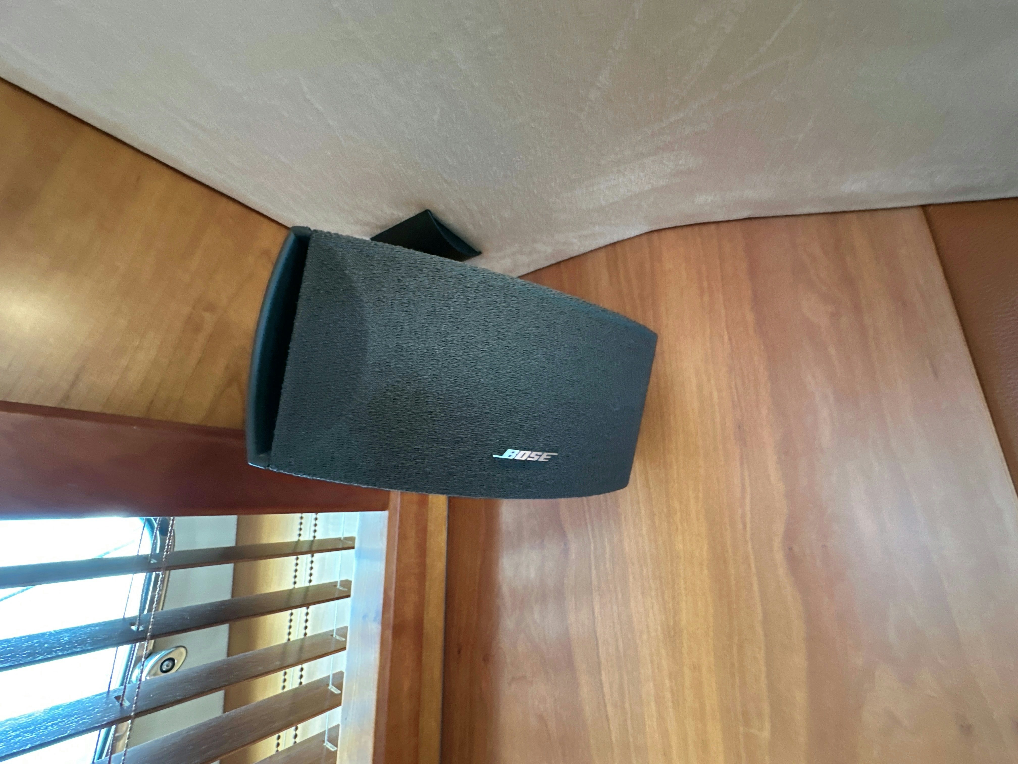 a black cell phone on a table aboard SWORDFISH 68 Yacht for Sale