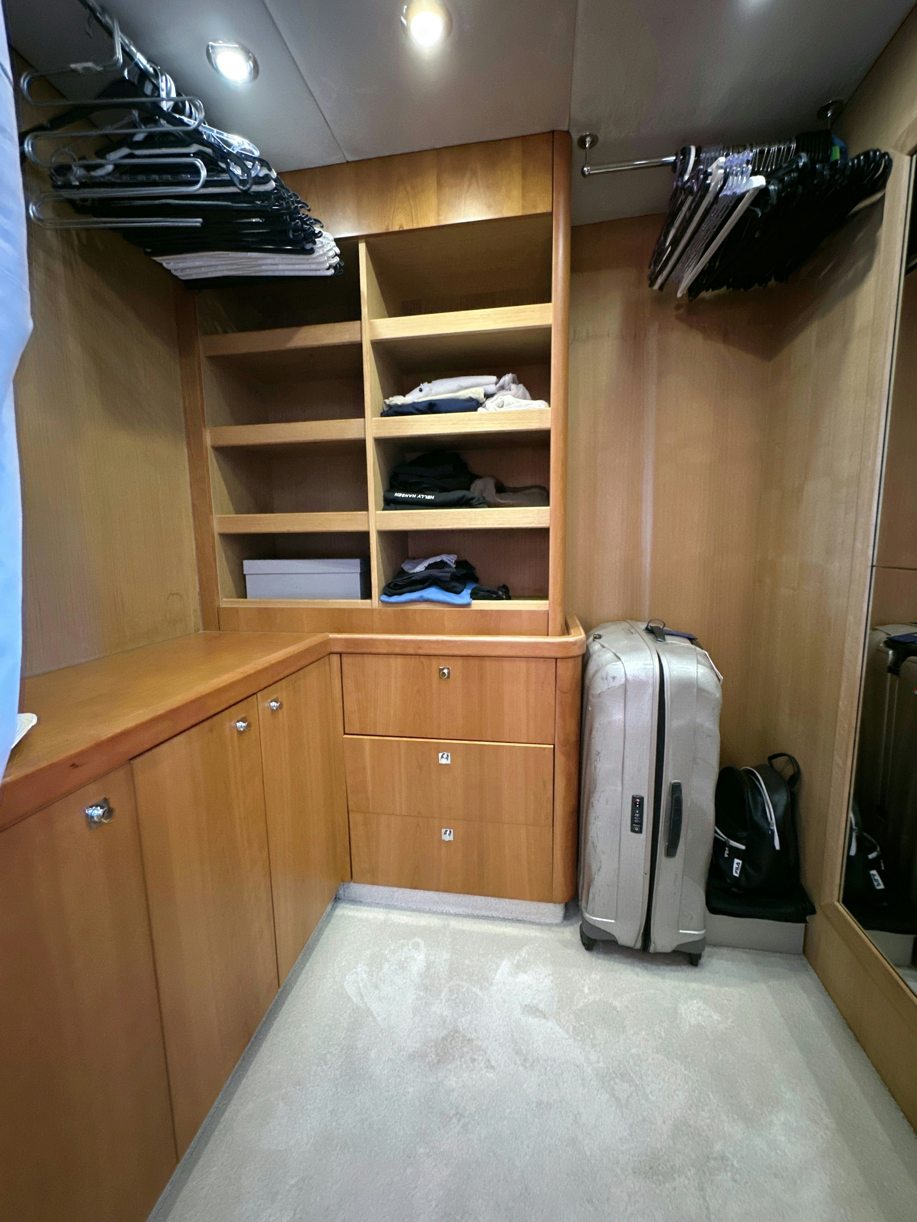 a room with a luggage aboard SWORDFISH 68 Yacht for Sale