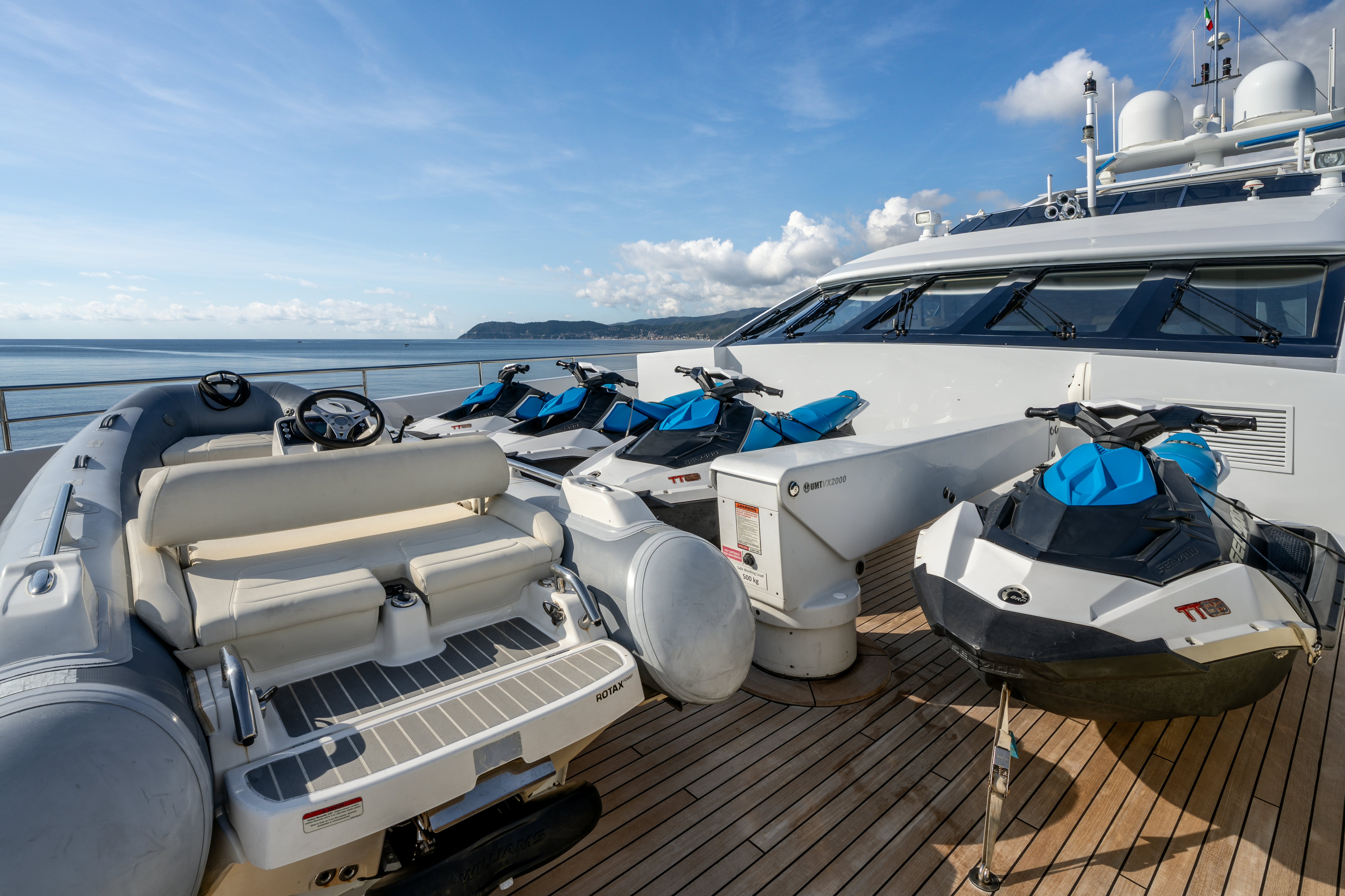 a boat with a couple of boats on it aboard G3 Yacht for Sale