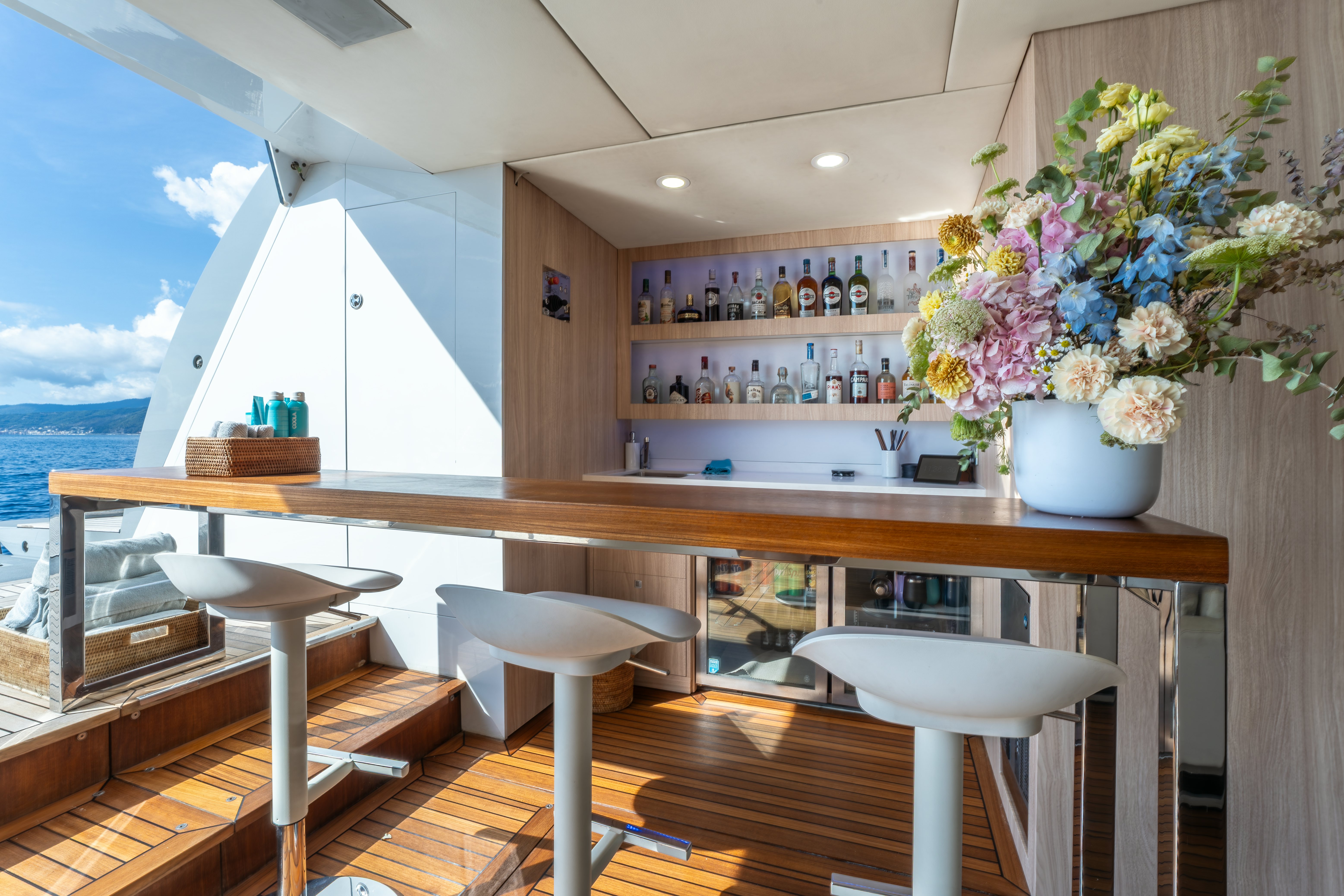 a bar with a table and chairs aboard G3 Yacht for Sale