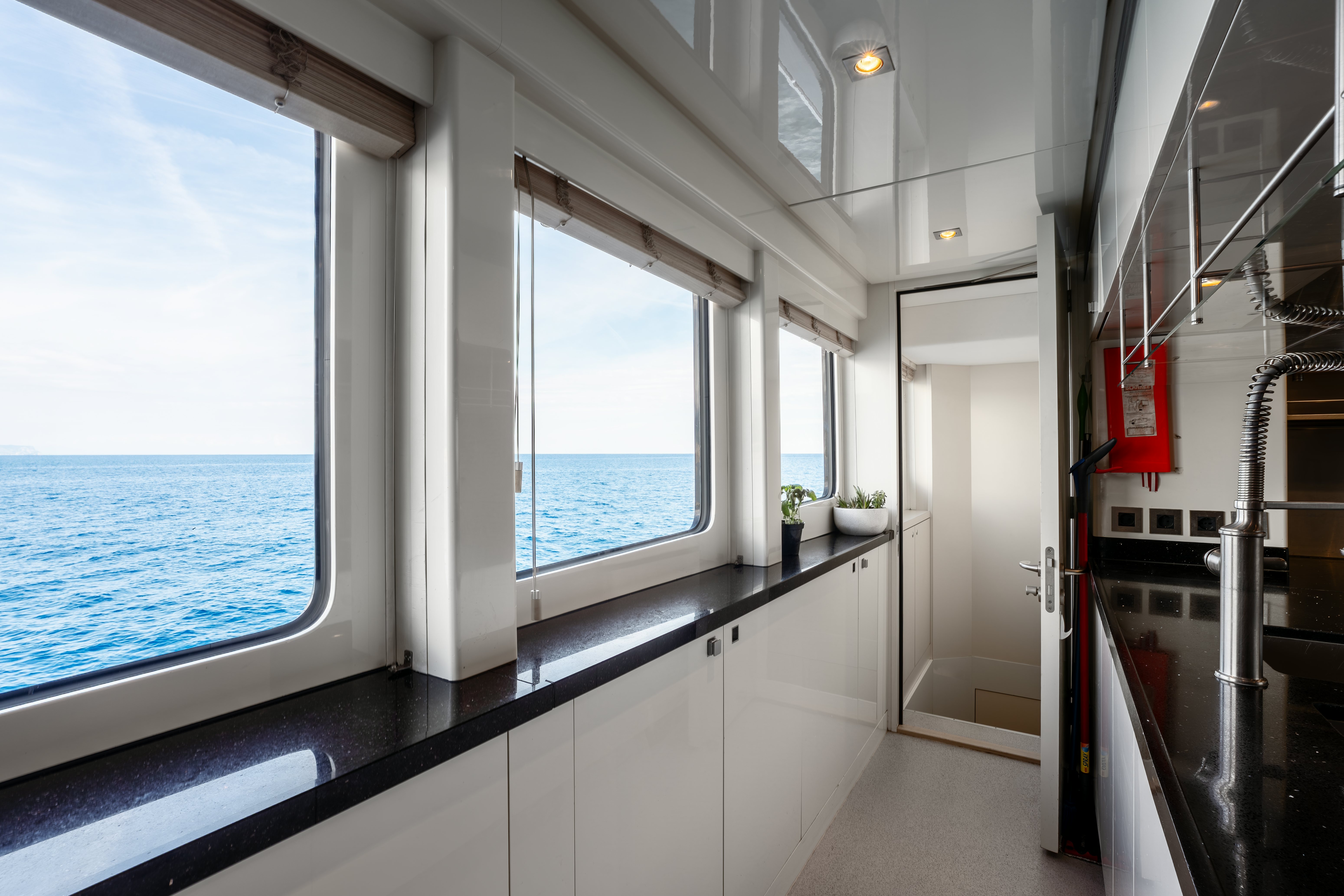 a kitchen with a window aboard G3 Yacht for Sale