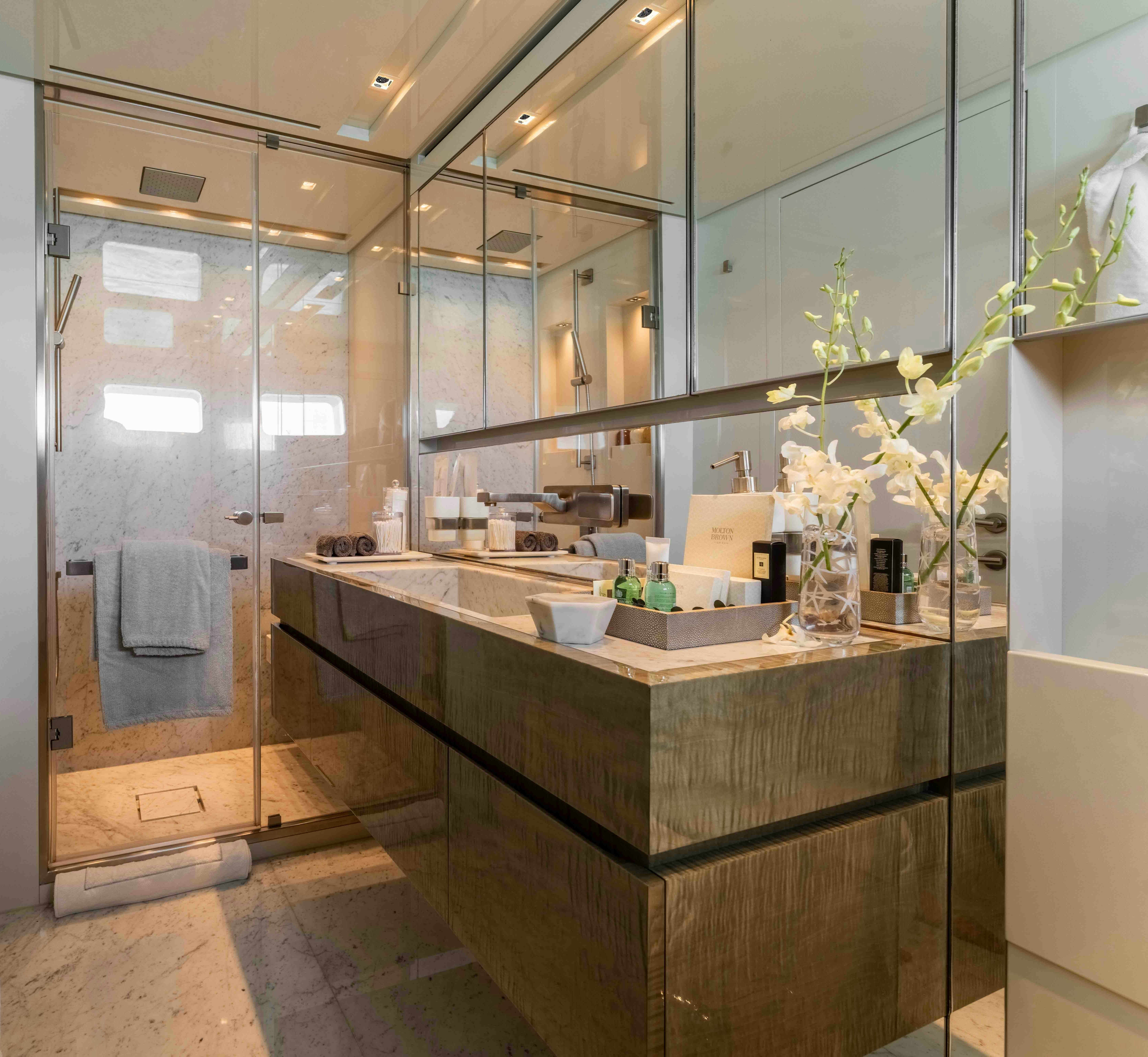 a bathroom with a countertop sink and a shower aboard PREMURA Yacht for Charter
