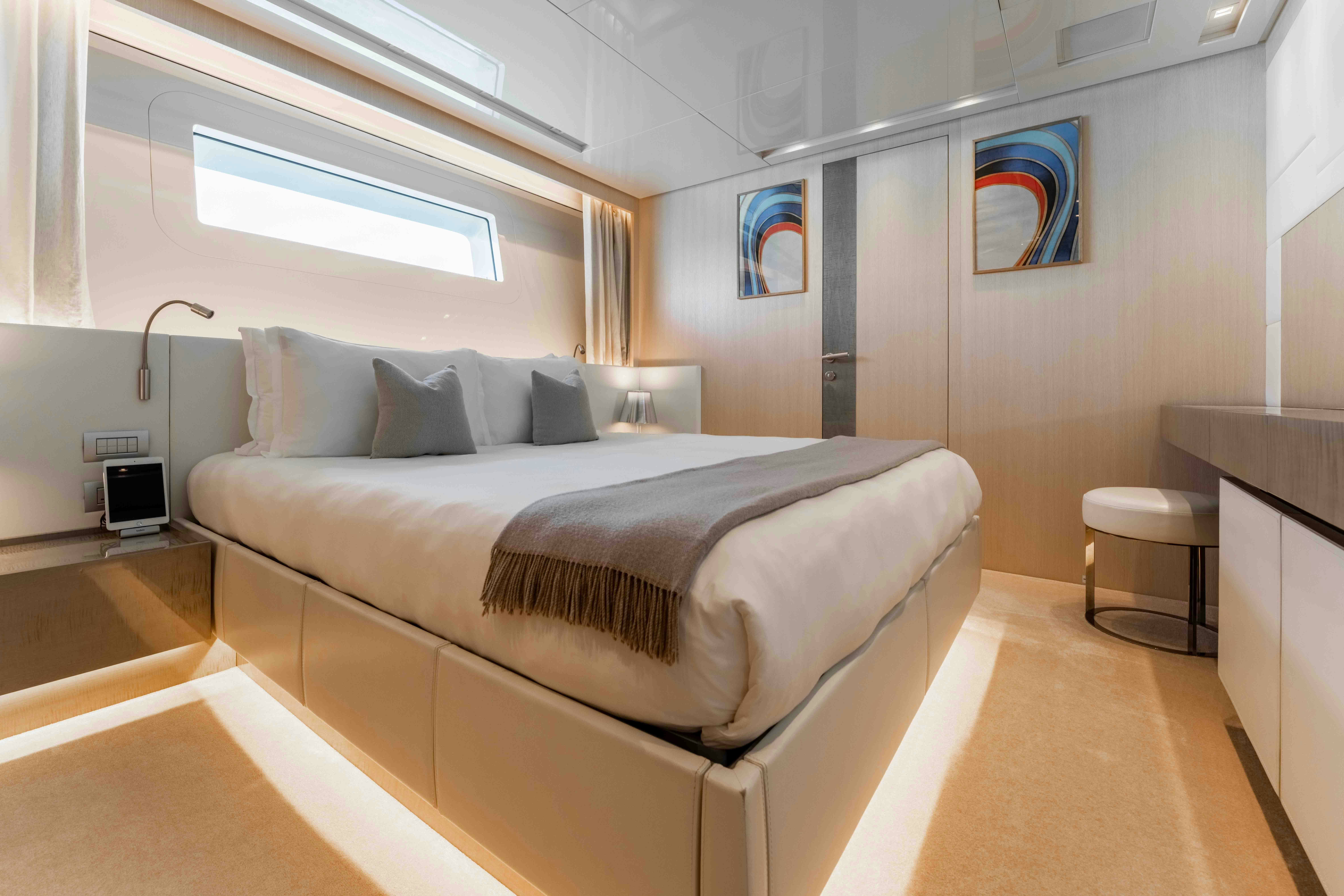 a bed in a room aboard PREMURA Yacht for Charter