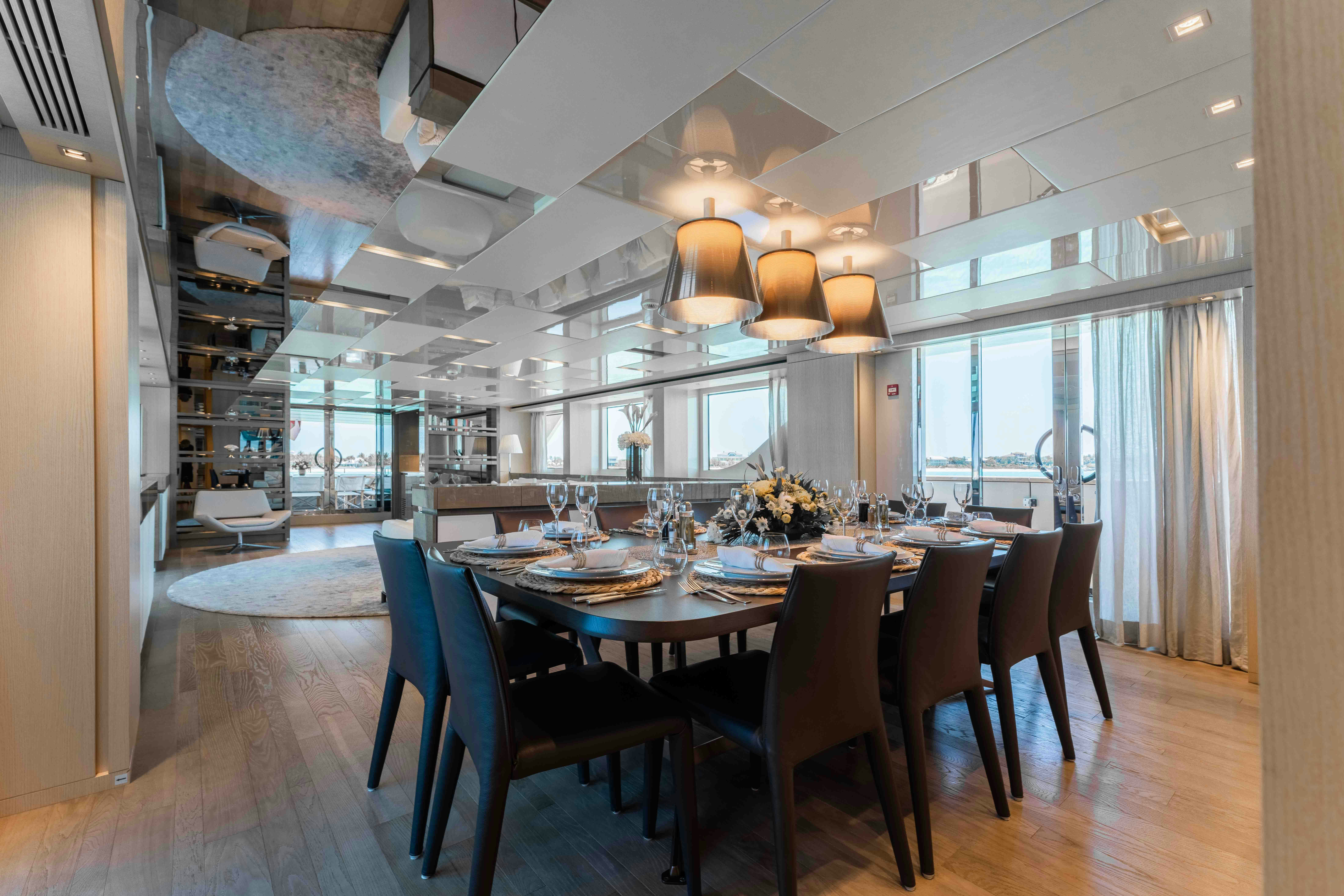 a dining room with a large table aboard PREMURA Yacht for Charter