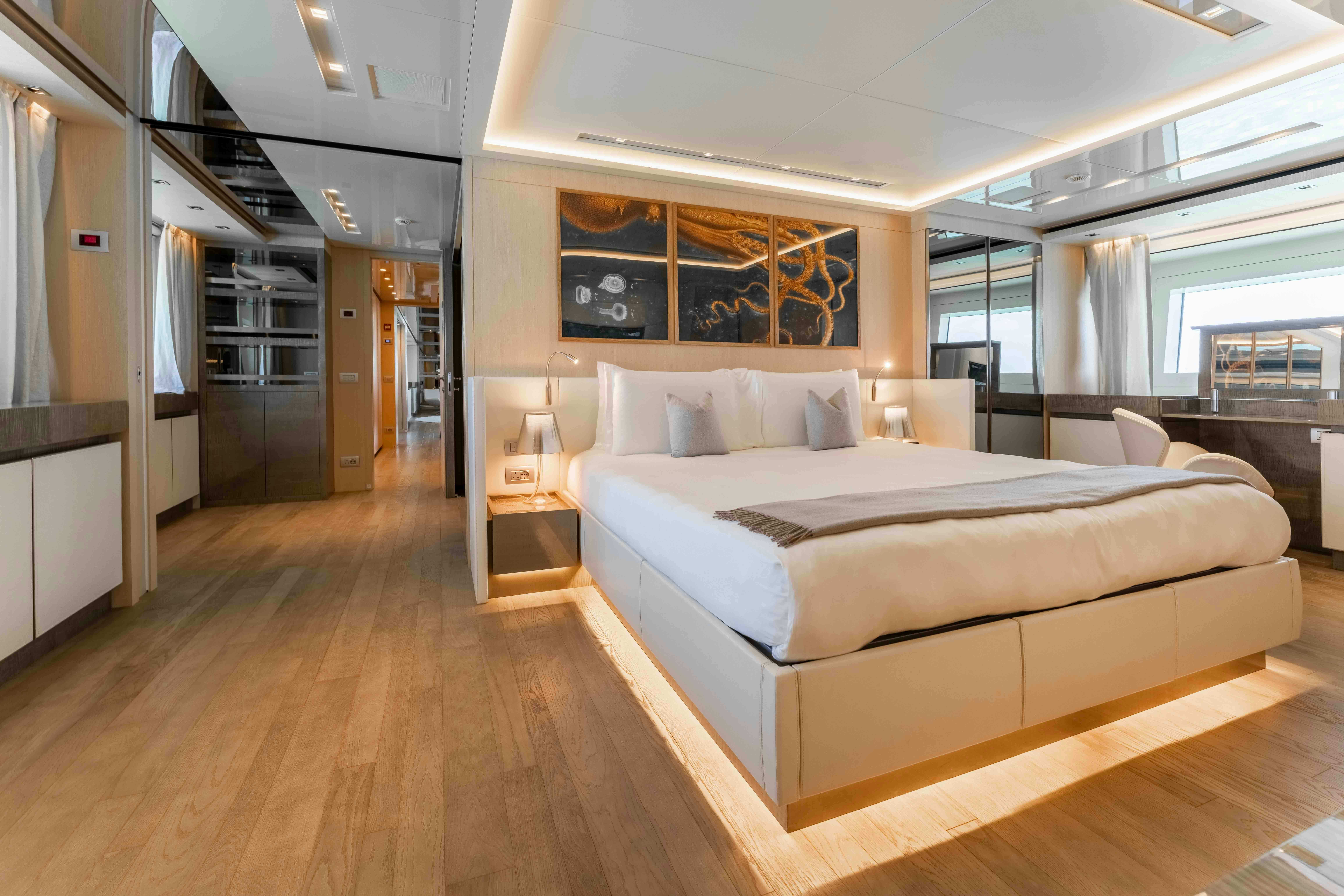a large bedroom with a large bed aboard PREMURA Yacht for Charter