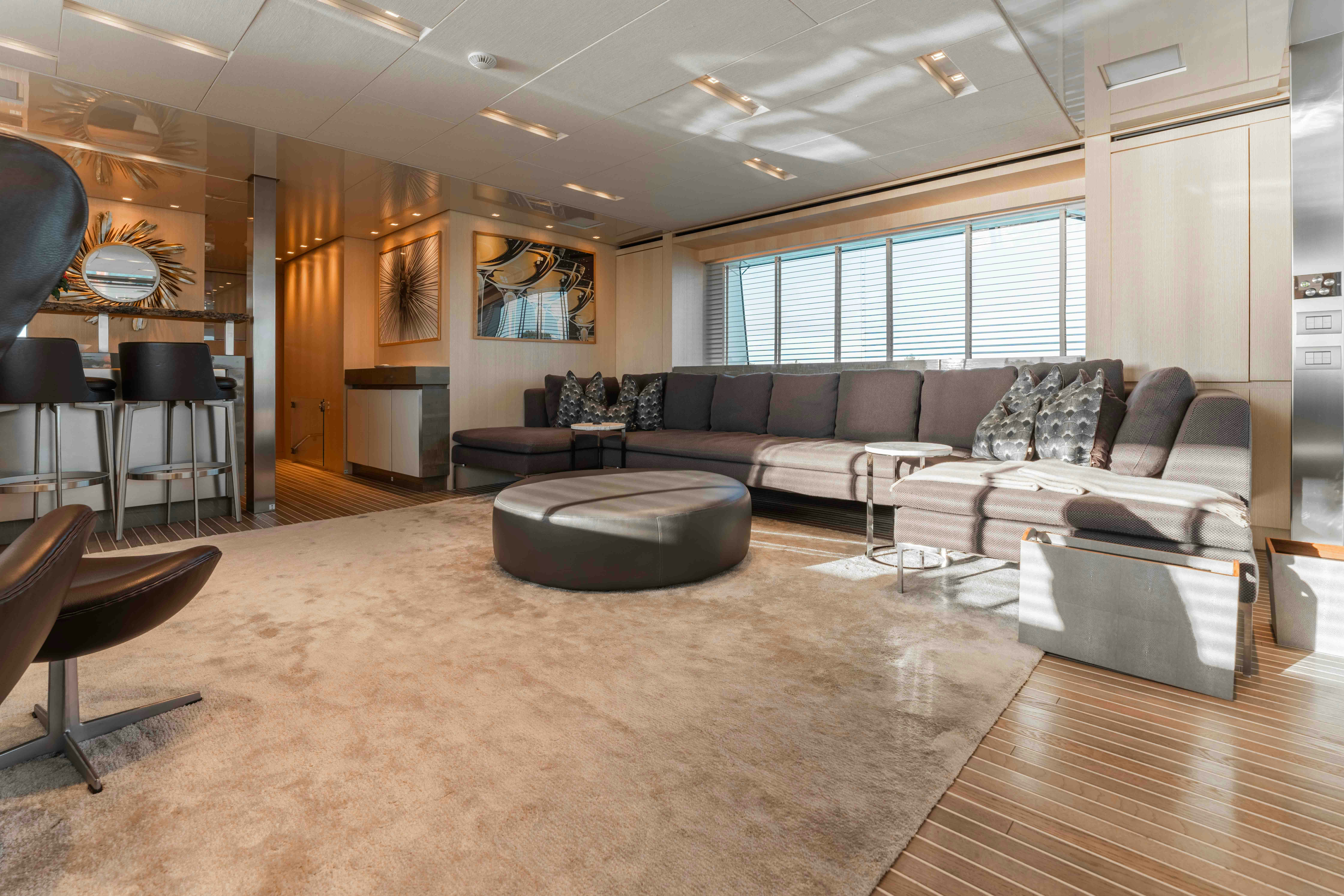 a living room with leather couches aboard PREMURA Yacht for Charter