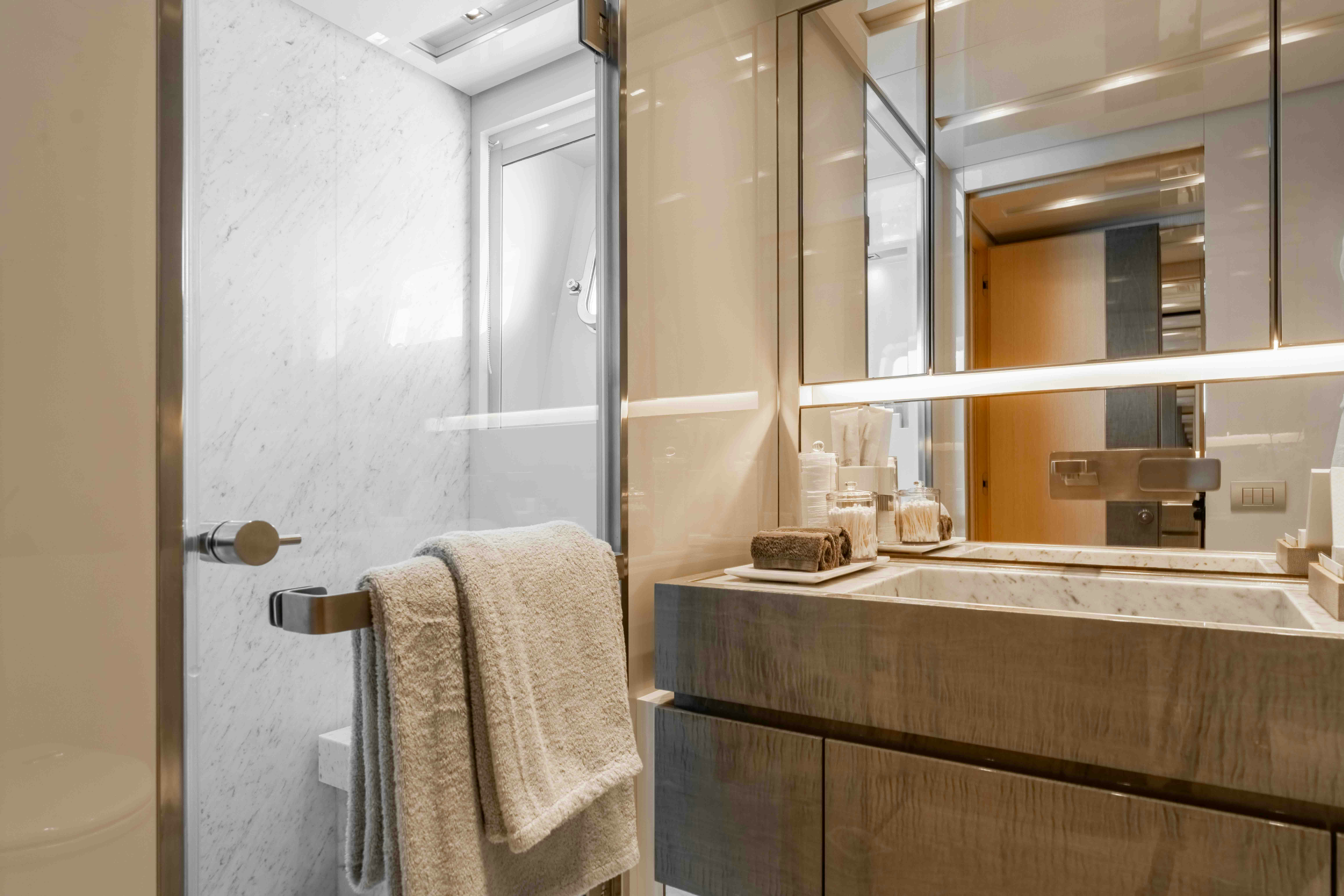a bathroom with a towel rack aboard PREMURA Yacht for Charter