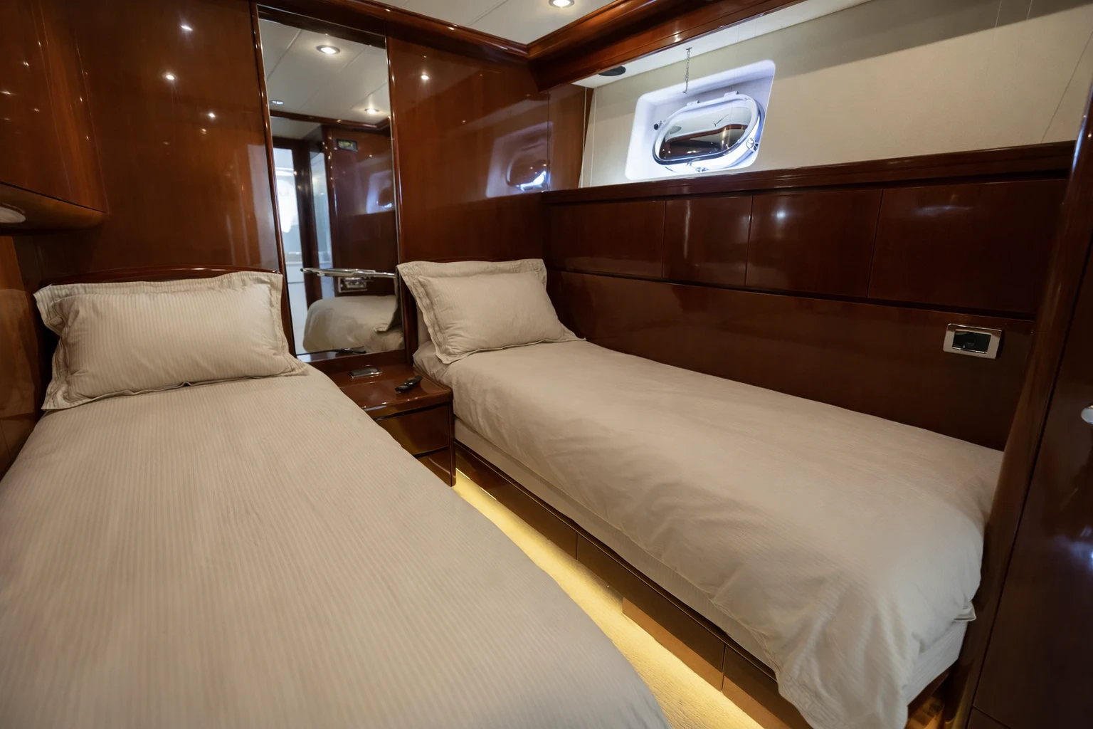 a room with two beds aboard NORTHSTAR I Yacht for Sale