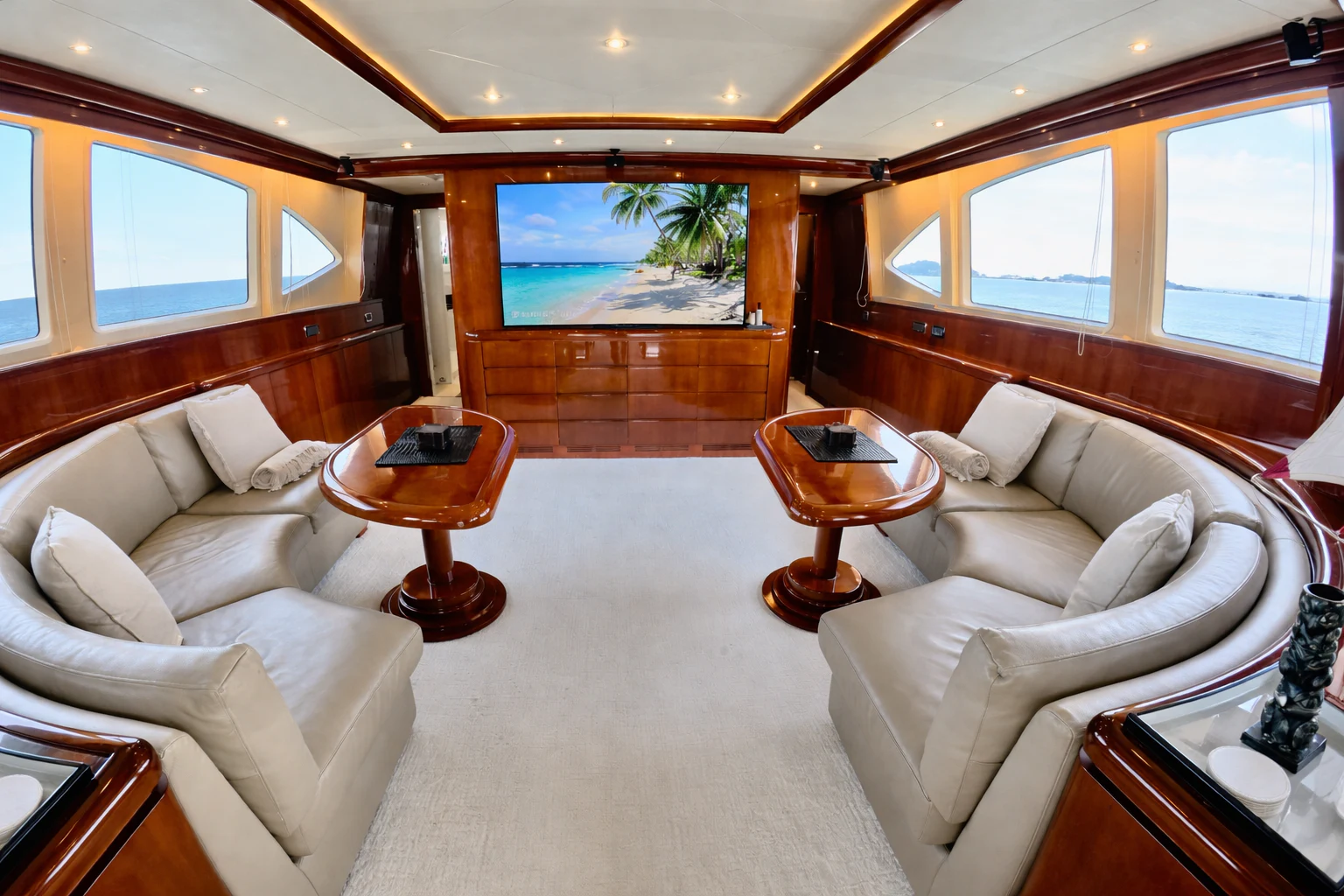 a living room with a wood floor aboard NORTHSTAR I Yacht for Sale