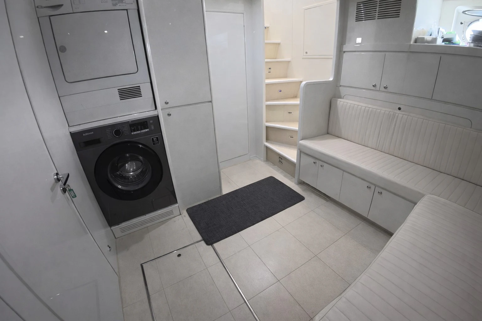 a room with a bed and a shelf aboard NORTHSTAR I Yacht for Sale