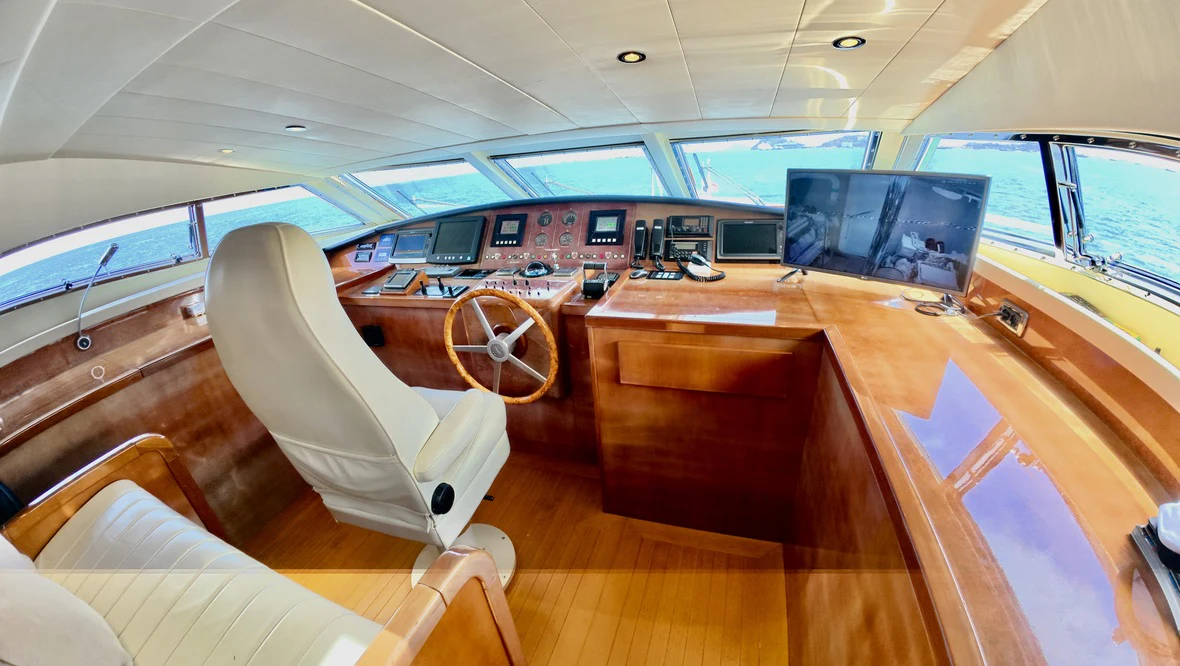 a room with a table and chairs aboard NORTHSTAR I Yacht for Sale