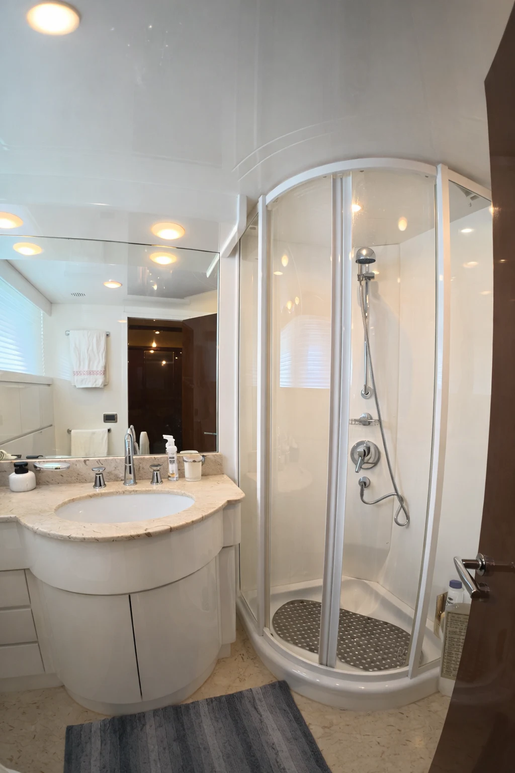 a bathroom with a shower and sink aboard NORTHSTAR I Yacht for Sale