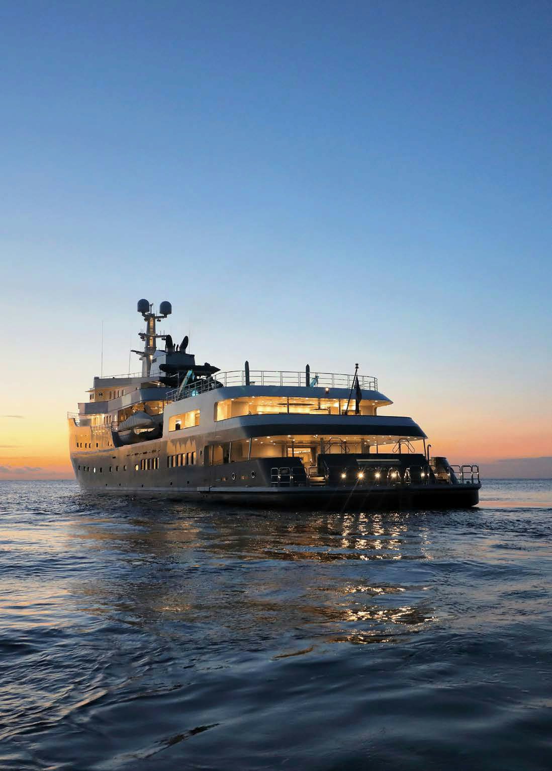 a boat on the water with Staten Island Ferry in the background aboard AQUA LARES Yacht for Charter
