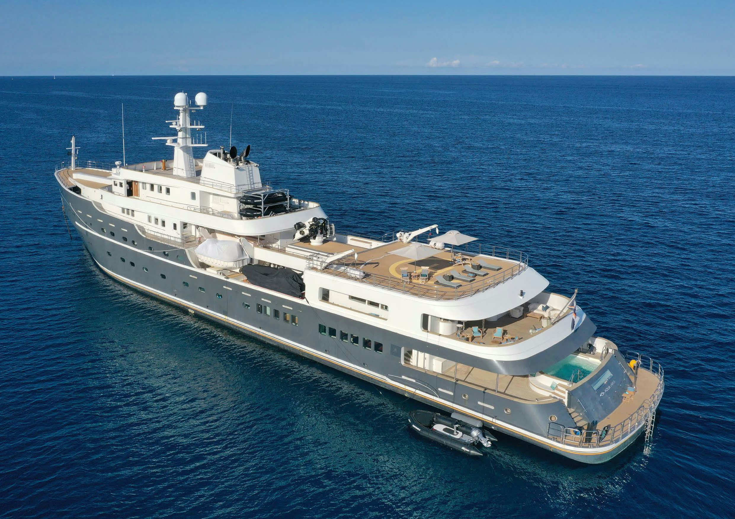 a large ship in the water aboard AQUA LARES Yacht for Charter