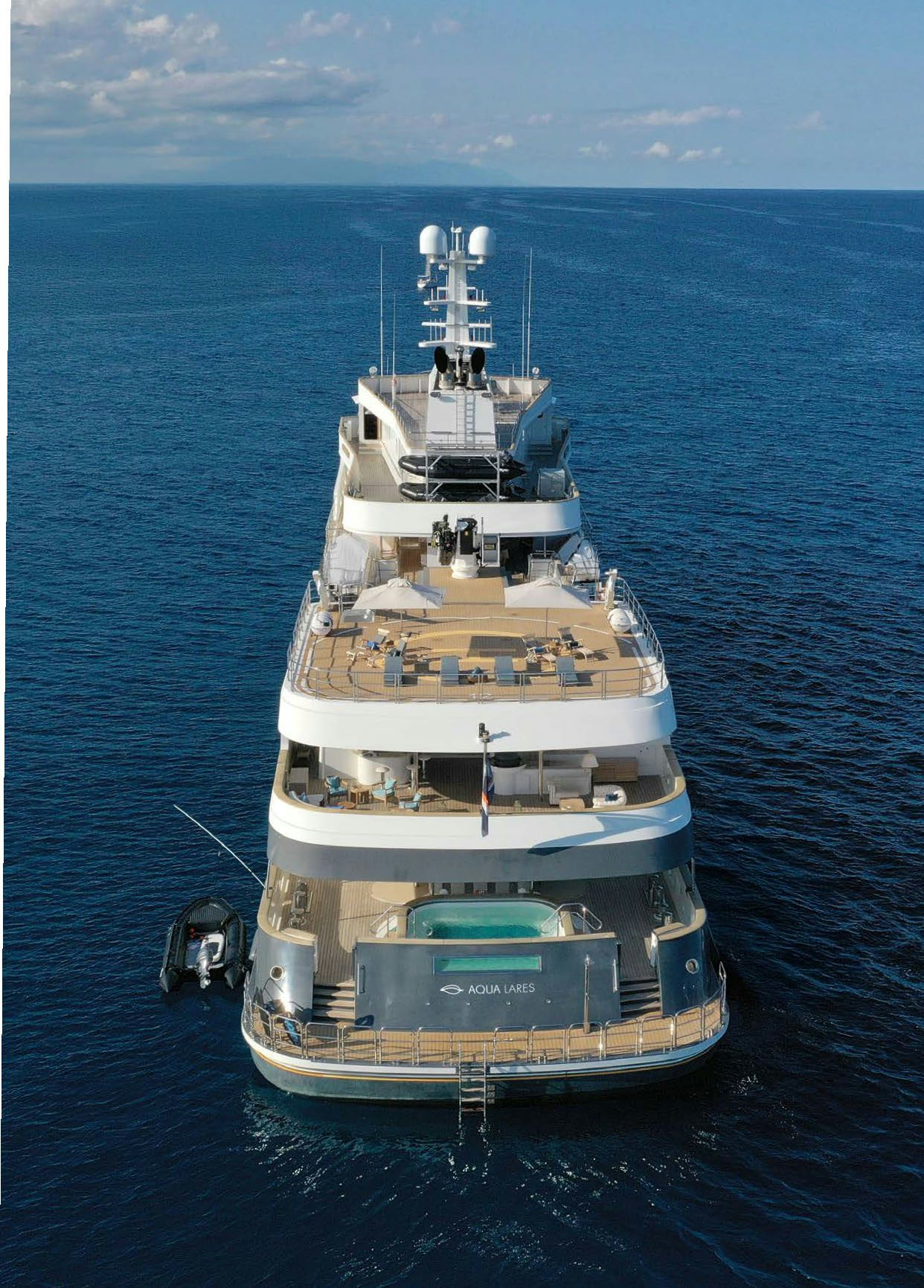 a large ship in the water aboard AQUA LARES Yacht for Charter