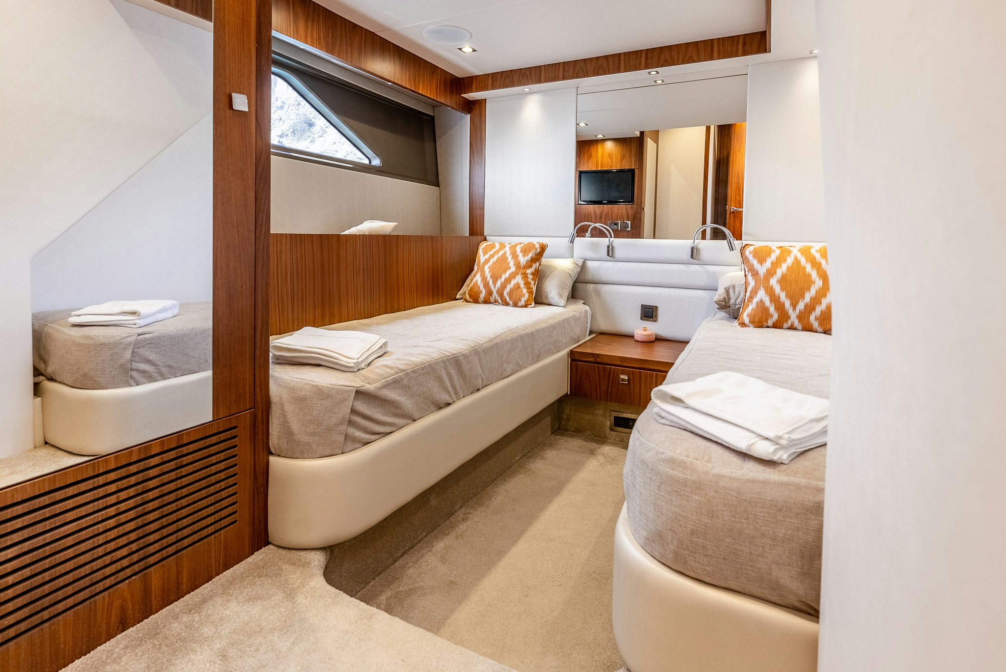 a room with two beds aboard ISLA DE FLORA Yacht for Sale