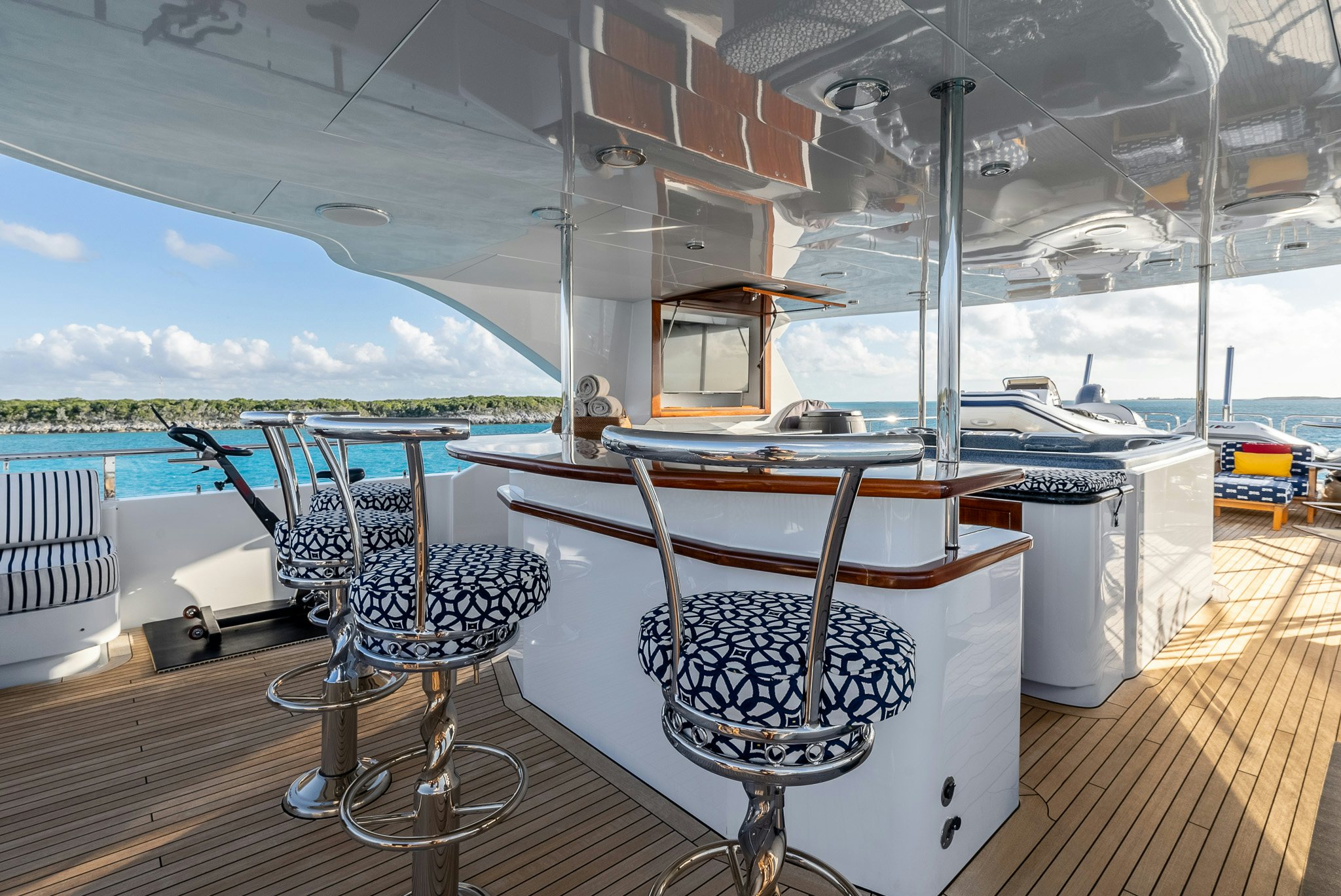 a table and chairs on a deck aboard CALLIOPE Yacht for Sale
