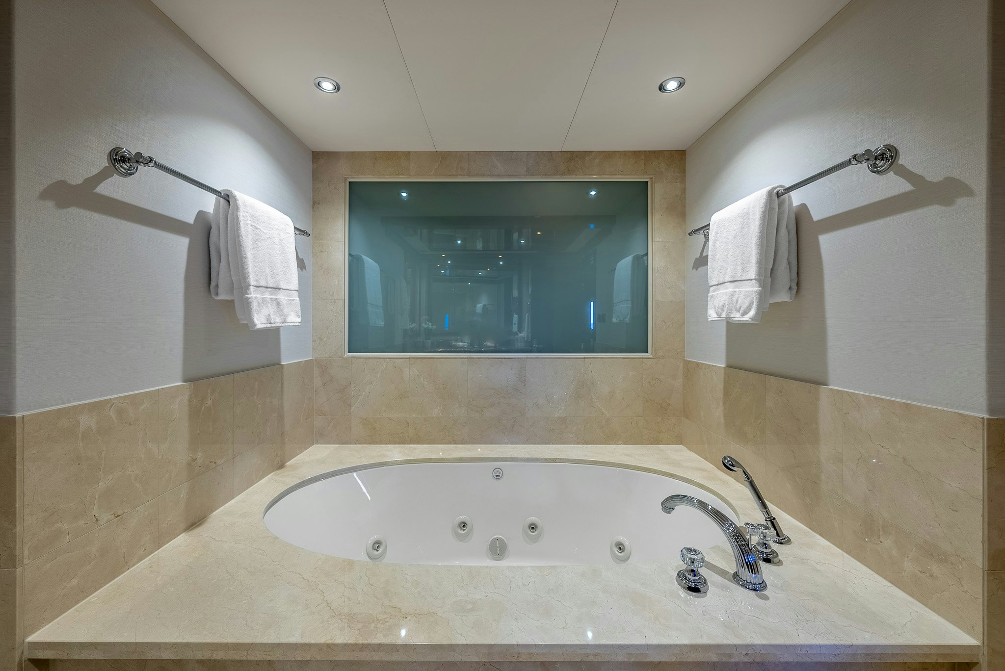 a bathroom with a large jacuzzi tub aboard CALLIOPE Yacht for Sale