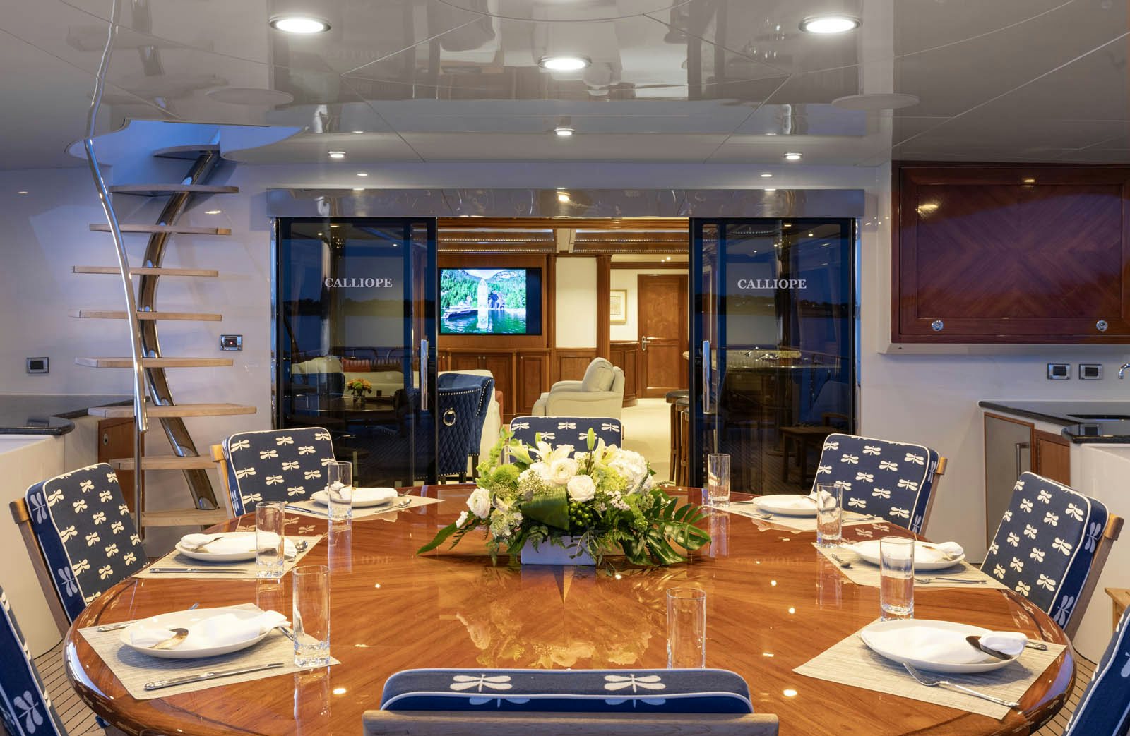 a large room with tables and chairs aboard CALLIOPE Yacht for Sale