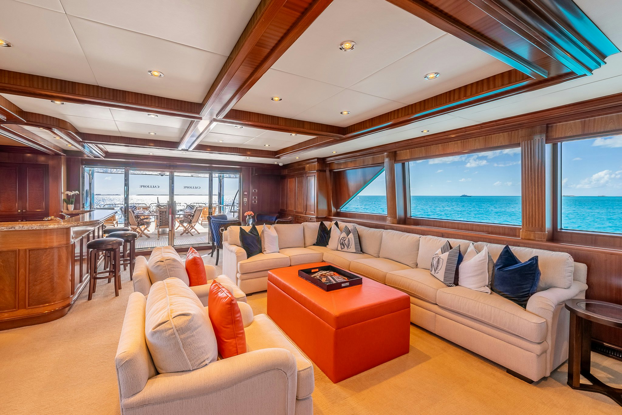 a living room with a large window aboard CALLIOPE Yacht for Sale