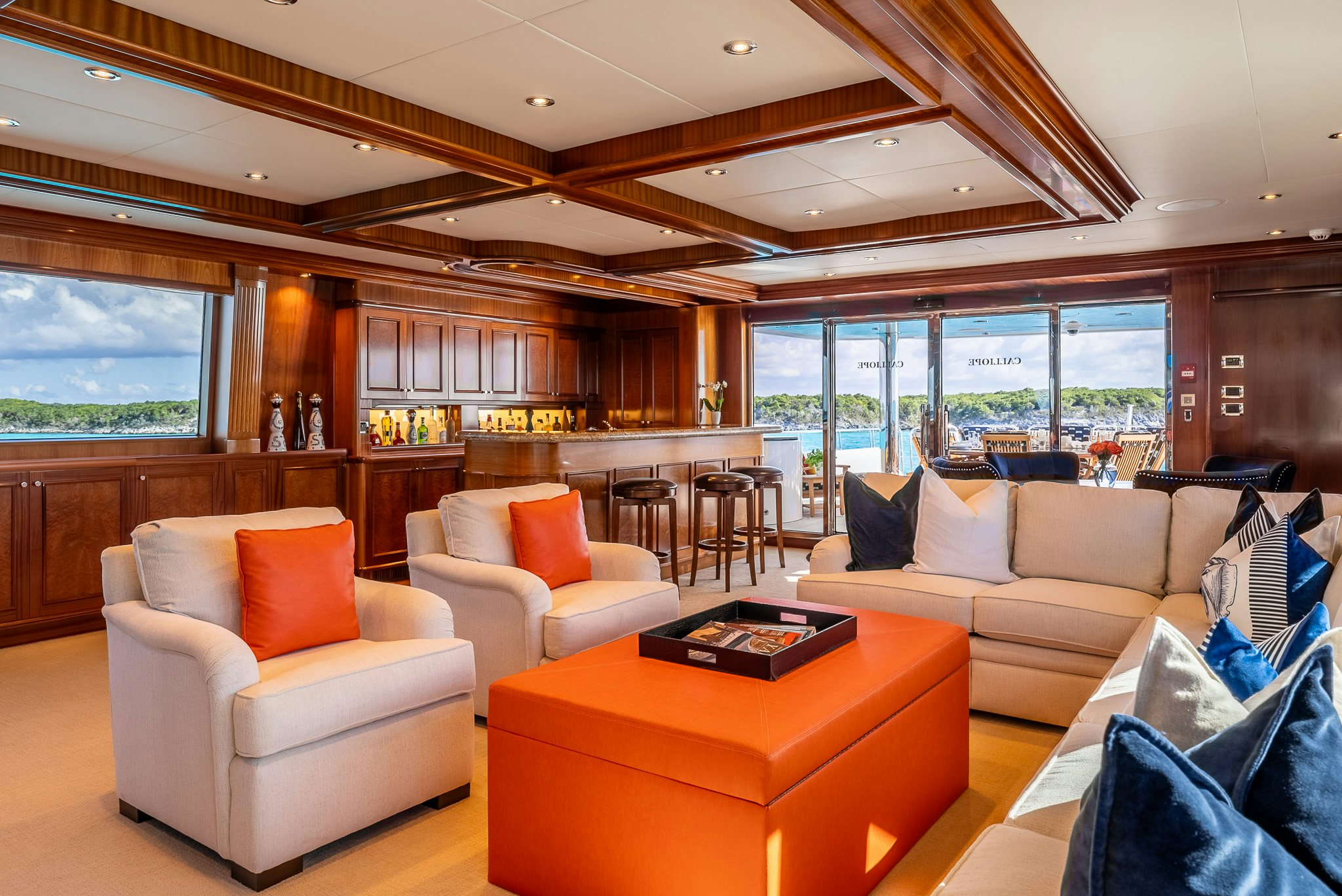 a living room with a large window aboard CALLIOPE Yacht for Sale